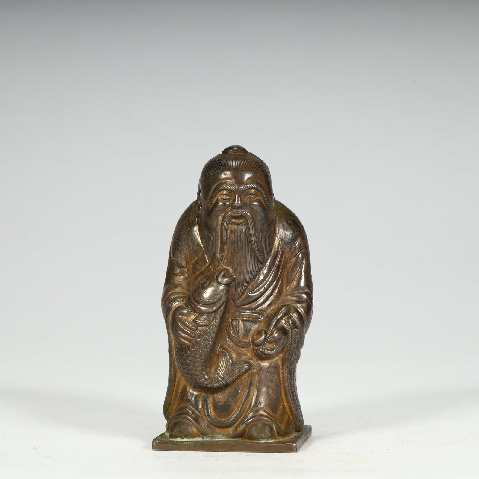 A silver statue of a fisherman from the Qing Dynasty (1 of 8)