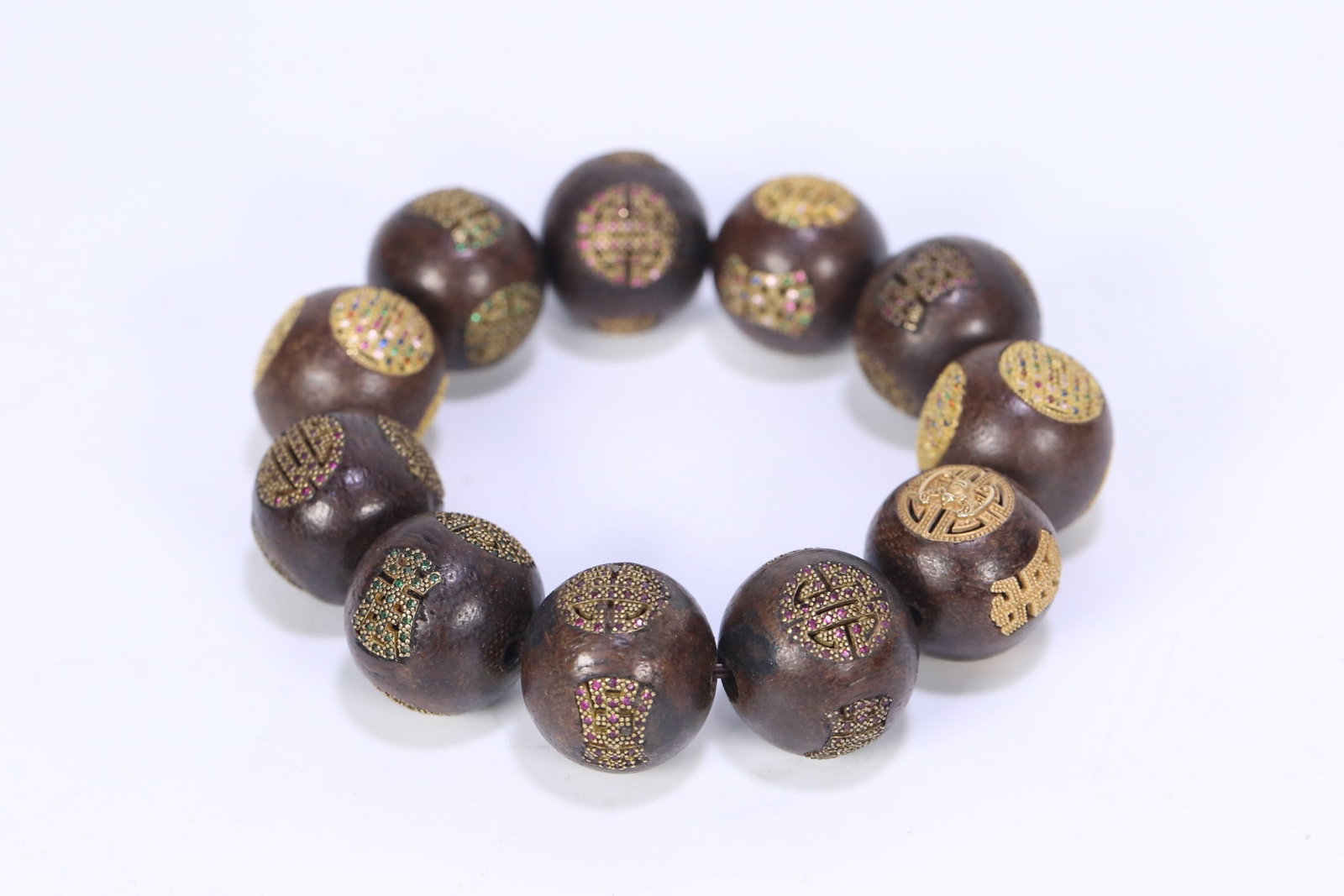 An old agarwood inlaid silver gilt Fushou pattern bracelet from the Qing Dynasty: Qing Dynasty old agarwood inlaid silver gilt Fushou pattern bracelet Size:2.3cm W:0.0858kg (The Dimensions Of All Batches Are Manually Measured.If You Need More Detailed Information, Please Contact Ou