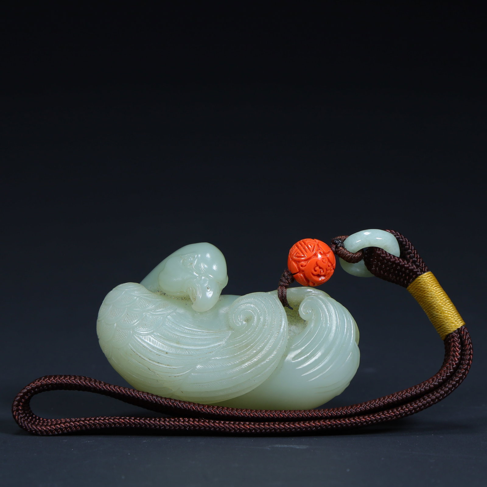 A Qing Dynasty Hetian jade goose-shaped handle: Qing Dynasty Hetian jade goose-shaped handle SIZE:H: 4cmL: 6.5cmW: 3cmW: 103g (The Dimensions Of All Batches Are Manually Measured.If You Need More Detailed Information, Please Contact Our Customer Se
