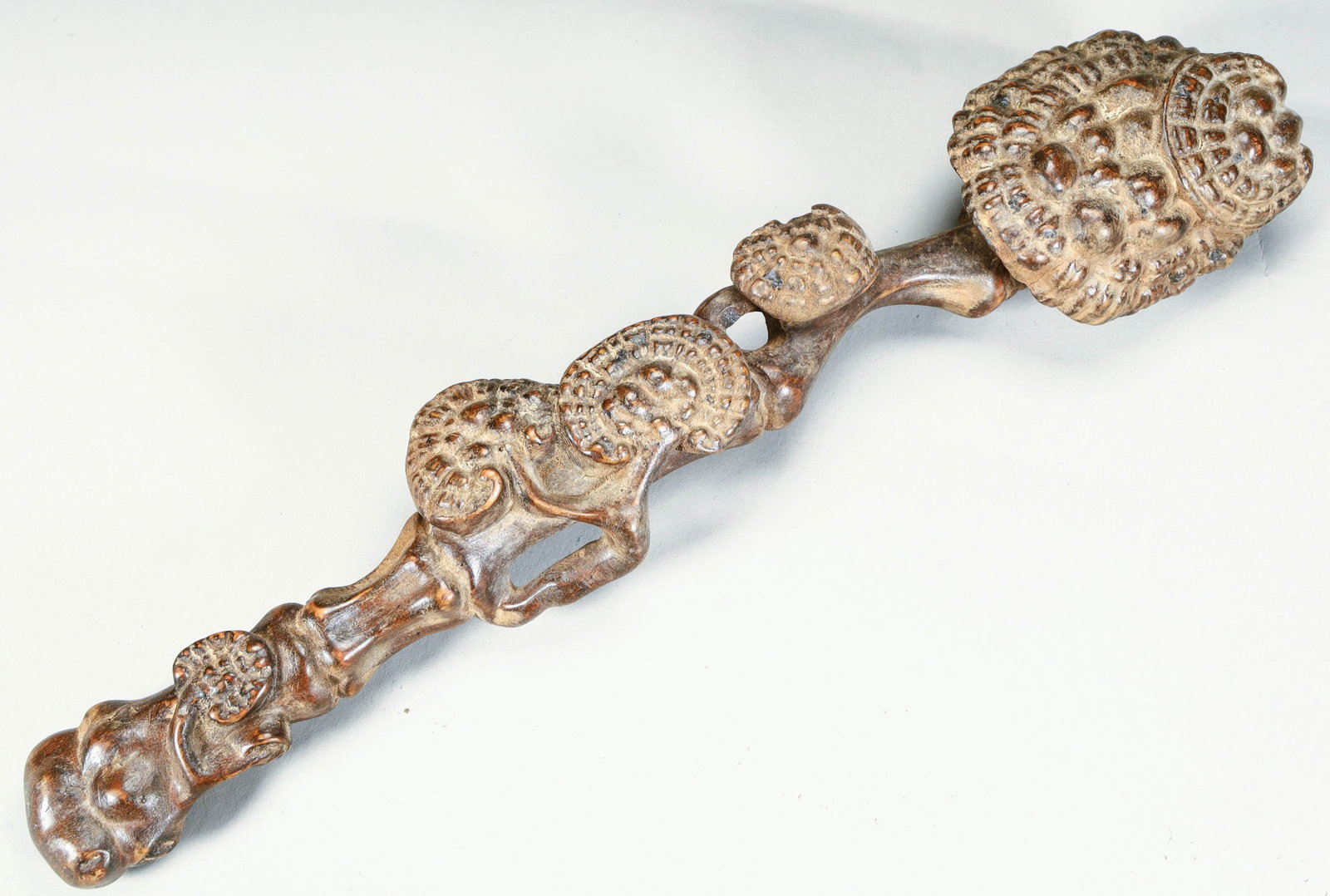 A Qing Dynasty boxwood wood carving Ganoderma lucidum pattern ruyi (1 of 9)