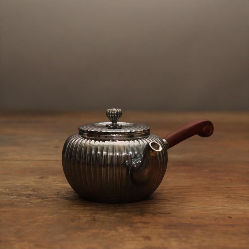 A sterling silver pot with a vertical rib pattern (1 of 7)