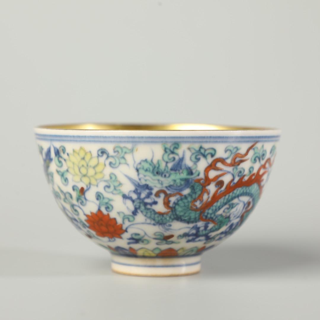 A Doucai cup made in the Chenghua year of the Ming Dynasty: The Doucai cup of the Ming Dynasty Chenghua year Size:H:4.5cm D:7.5cm (The Dimensions Of All Batches Are Manually Measured.If You Need More Detailed Information, Please Contact Our Customer Service Be