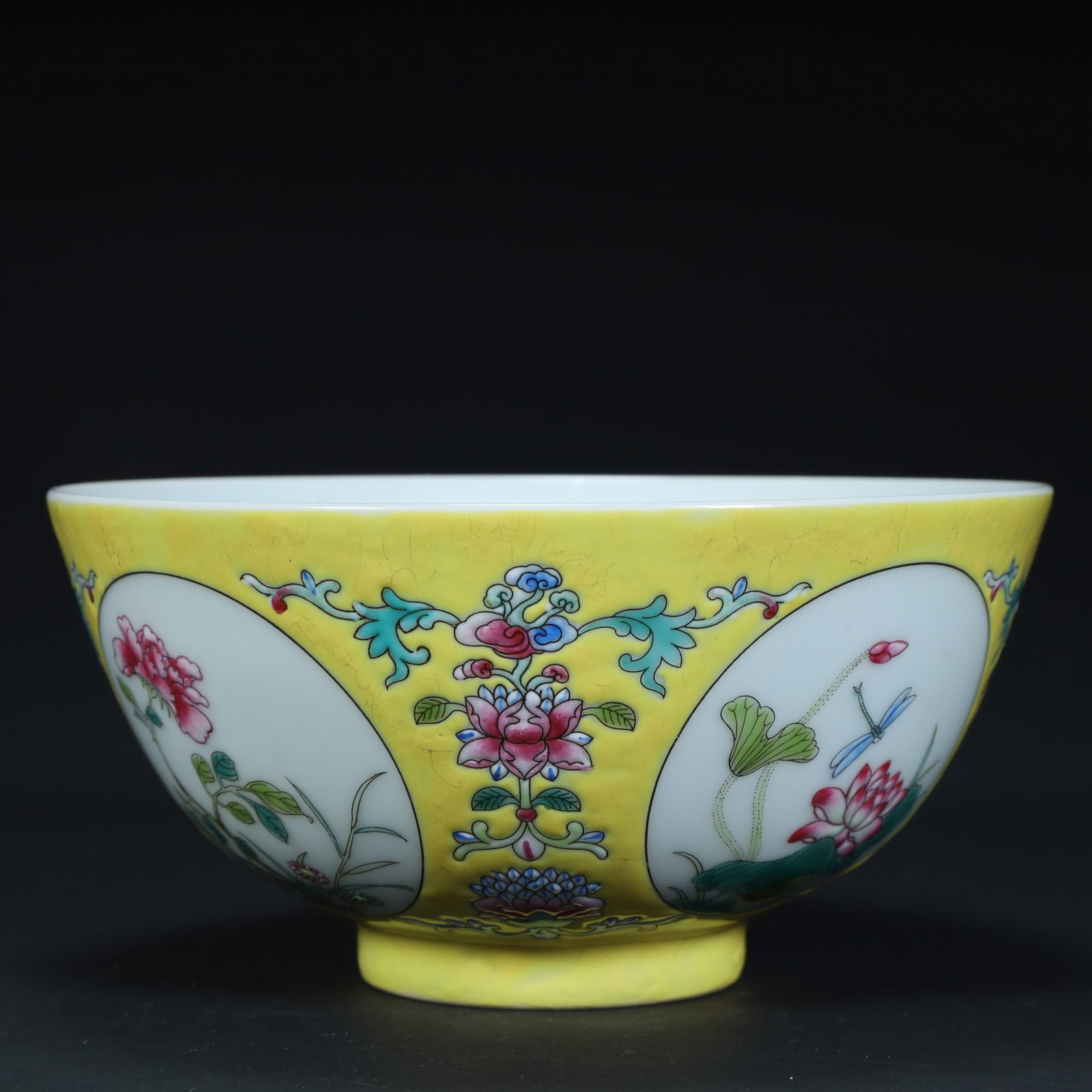A yellow pastel consecrated floral pattern bowl made in the Yongzheng period of the Qing Dynasty: The Yongzheng year of the Qing Dynasty made a yellow pastel consecrated flower pattern bowl size:H:7cm L: 14cmW:14cmW: 218g (The Dimensions Of All Batches Are Manually Measured.If You Need More Detail