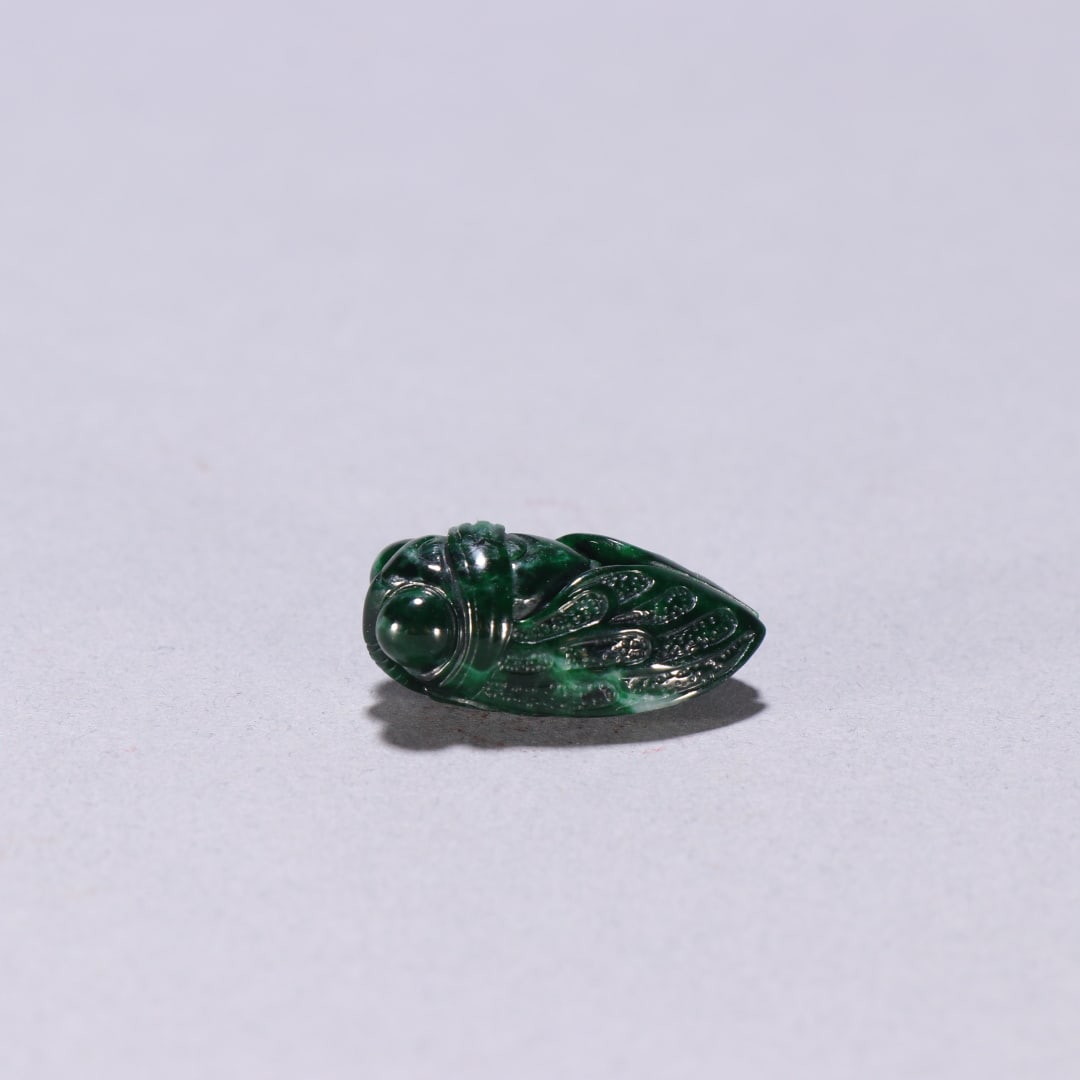 A beautiful jade cicada carving: Exquisite jade cicada carvings Size:H:1.1cm W:2.6cm W:0.0063kg (The Dimensions Of All Batches Are Manually Measured.If You Need More Detailed Information, Please Contact Our Customer Service Before Bi