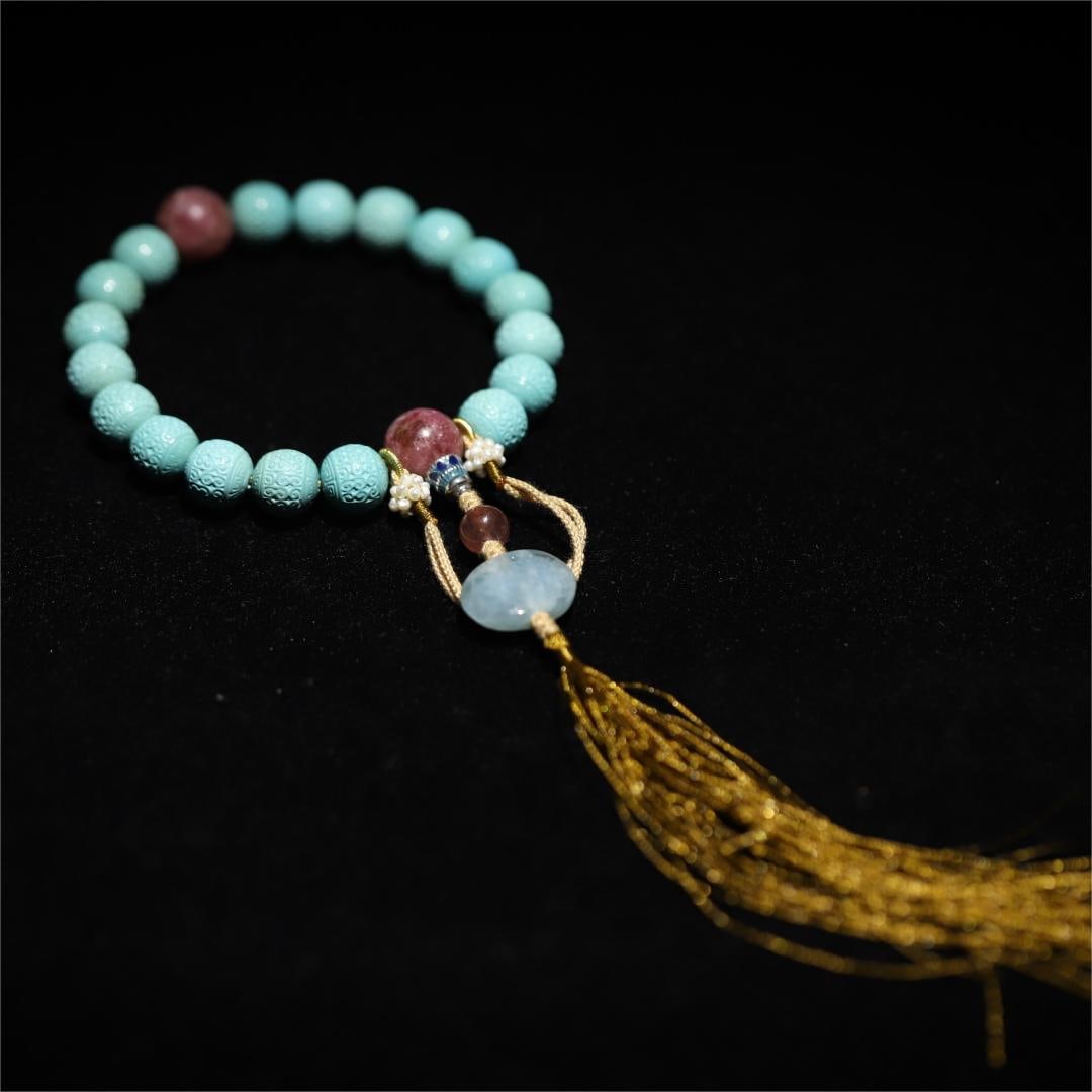 A fine turquoise with ruby handheld: Exquisite turquoise with ruby handheld Size:Pearl diameter:1.15cm W:0.0442kg (The Dimensions Of All Batches Are Manually Measured.If You Need More Detailed Information, Please Contact Our Customer Ser