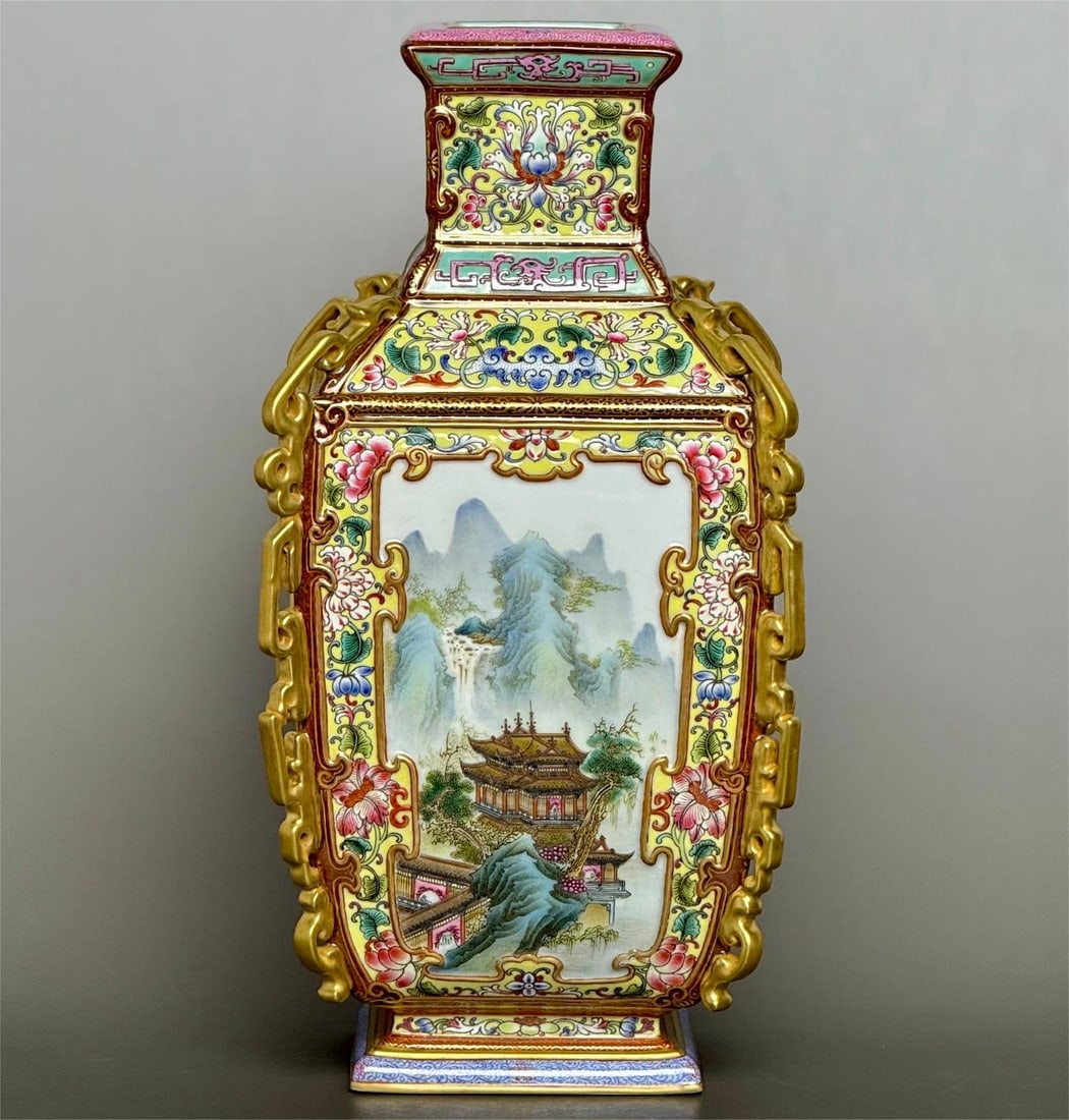 A yellow land Ruifu entwined lotus pattern landscape pavilion with a dragon sculpture made in the: Qing Dynasty Qianlong year Huangdi Ruifu entwined lotus pattern landscape pavilion open window dragon sculpture gold-rimmed square bottle Size:Calibre:5cm H:29.2cm Belly diameter:15cm Bottom:9.5cm (Th