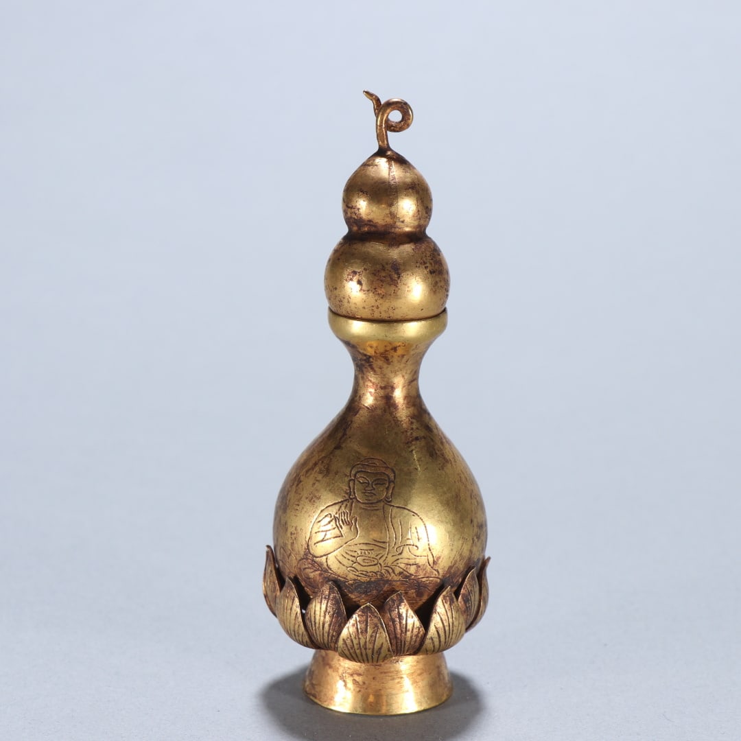 A copper-gilt relic jar from the Tang Dynasty: Tang Dynasty copper gilt relic jar Size:H:9.9cm W:3.8cm W:0.0602kg (The Dimensions Of All Batches Are Manually Measured.If You Need More Detailed Information, Please Contact Our Customer Service Befor