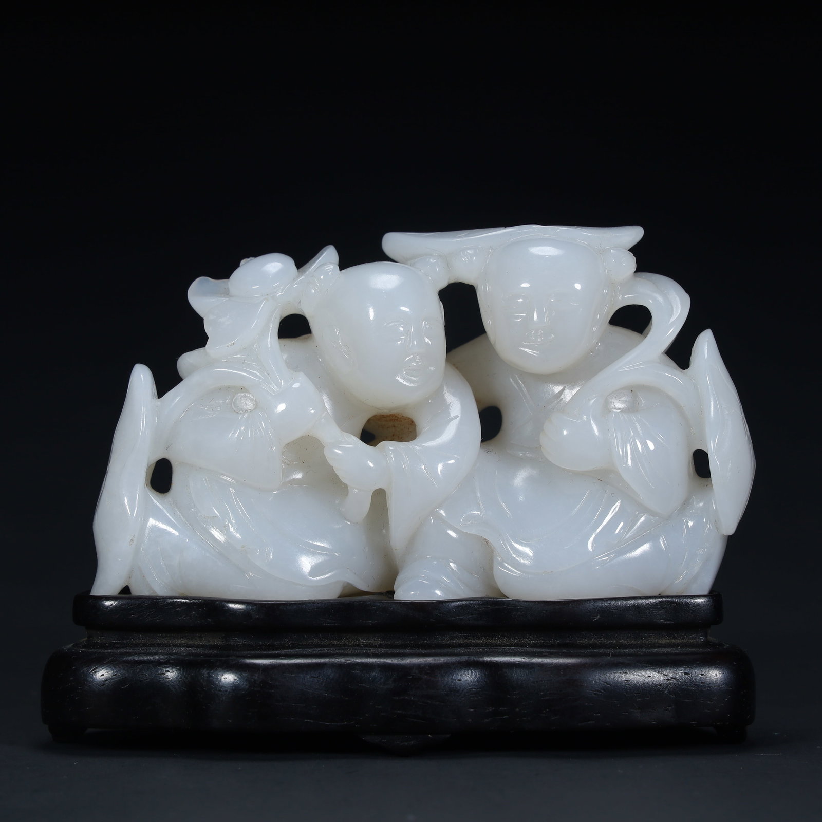 A Qing Dynasty Hetian white jade and two immortal ornaments (1 of 11)