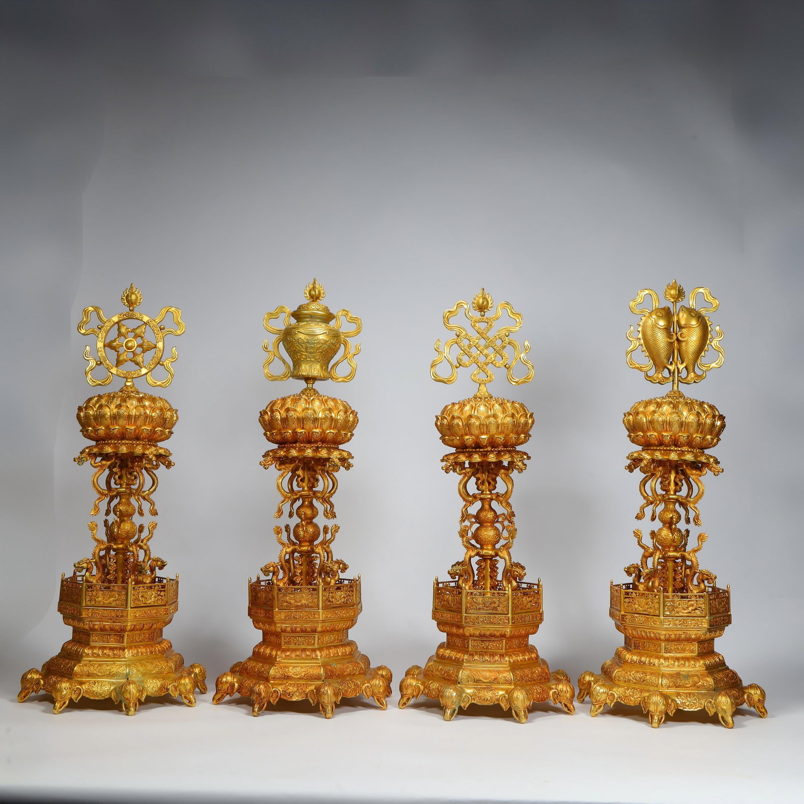 A set of gilded Buddhist eight treasure offerings from the Qing Dynasty: A set of gilded Buddhist eight treasure offerings from the Qing Dynasty Size:H:55cmxL:24cmxW:24cm W: 5.4kg (The Dimensions Of All Batches Are Manually Measured.If You Need More Detailed Information, P
