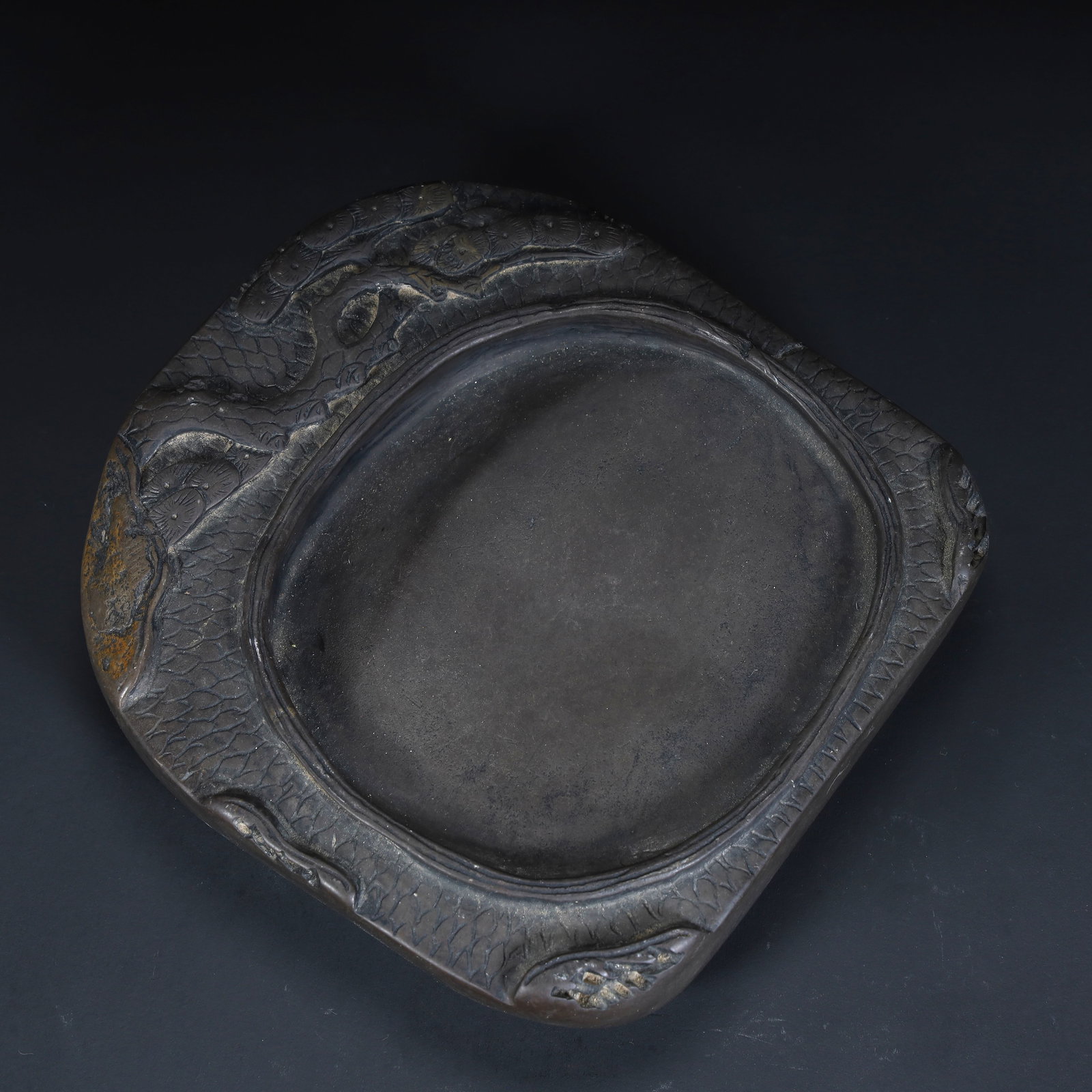 A Qing Dynasty stone carving auspicious cloud dragon seawater pattern inkstone: The Qing Dynasty's end stone carving auspicious cloud divine dragon sea water pattern inkstone Size:H:3.5cmxL:14.5cmxW:14.5cm W: 1.778kg (The Dimensions Of All Batches Are Manually Measured.If You Nee