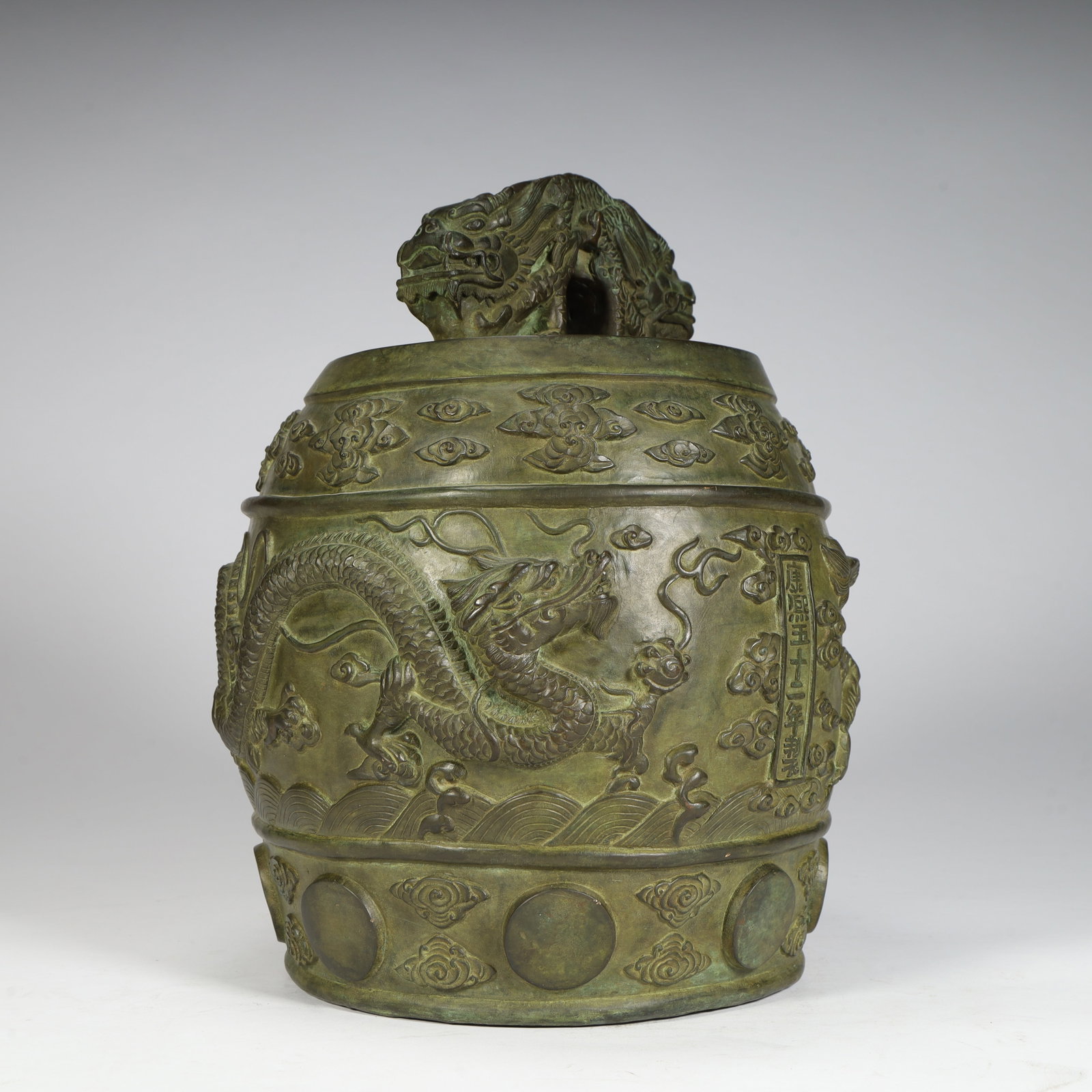 A Qing Dynasty Kangxi bronze tyre cloud dragon pattern chime (1 of 11)
