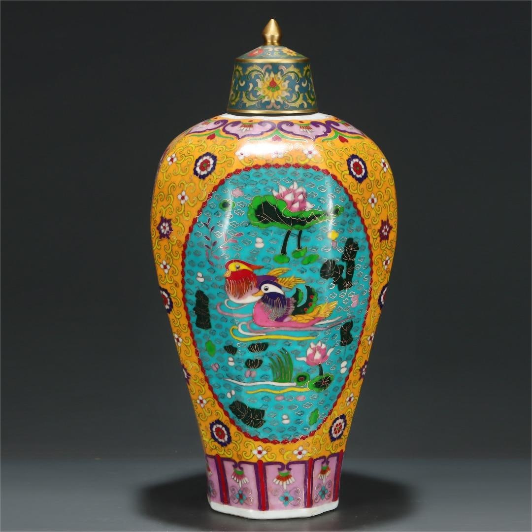 A Ming Dynasty cloisonné enamel yellow ground passionflower window mandarin duck playing in the: Ming Dynasty cloisonné enamel yellow ground passionflower open window mandarin duck playing in the water Bafang plum bottle Size:H:50.5cm Belly diameter:26.5cm (The Dimensions Of All Batches Are Manu