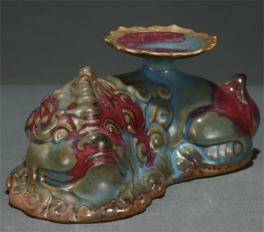 A crouching tiger lamp from the Song Dynasty Ding kiln: The crouching tiger lamp of the Song Dynasty Ding kiln Size:H:10cm Belly diameter:22.8cm (The Dimensions Of All Batches Are Manually Measured.If You Need More Detailed Information, Please Contact Our 