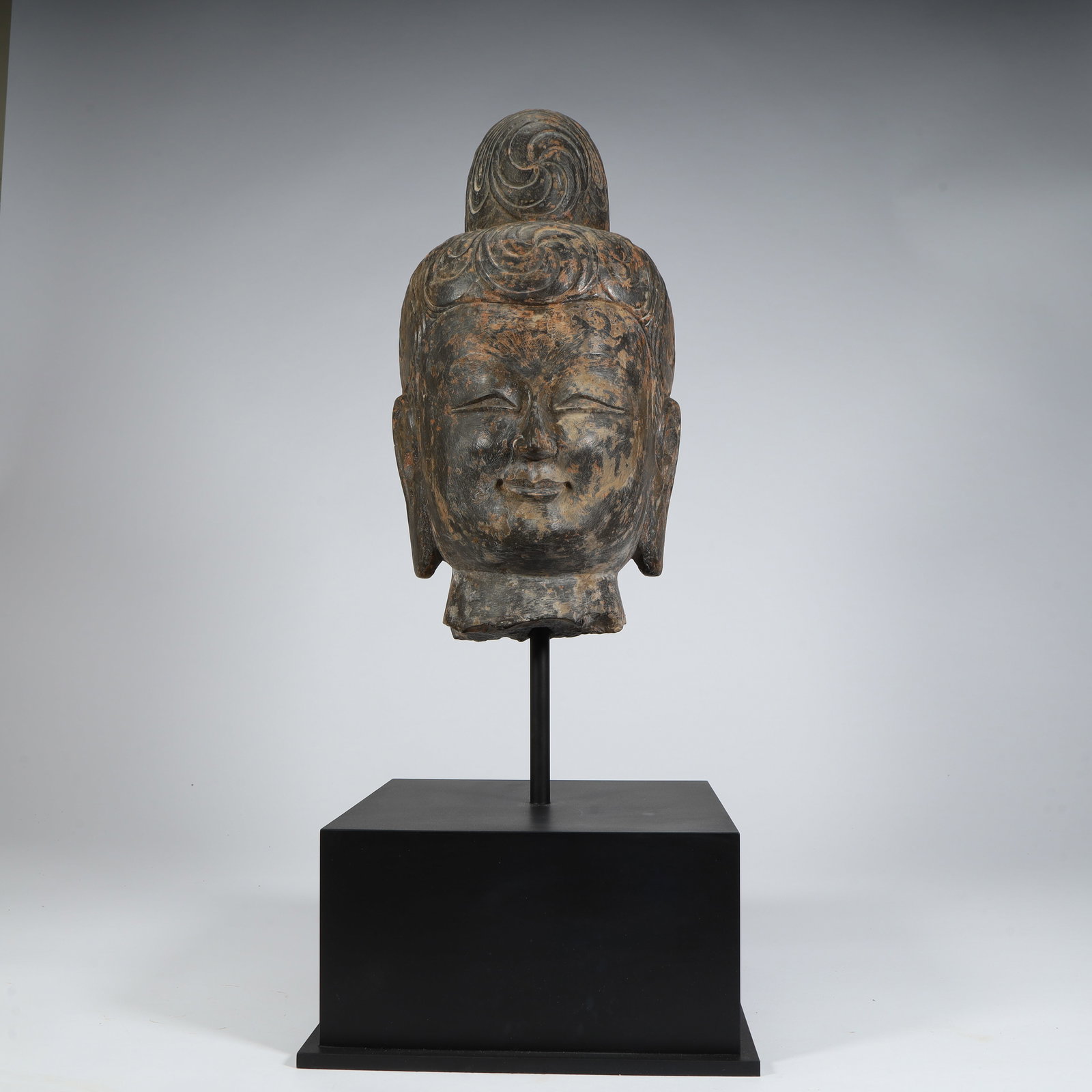 A stone carved Bodhisattva head of the Tang Dynasty: Tang Dynasty stone carved Bodhisattva head Size:H:35cmxL:17cmxW:17cm W: 14kg (The Dimensions Of All Batches Are Manually Measured.If You Need More Detailed Information, Please Contact Our Customer Ser