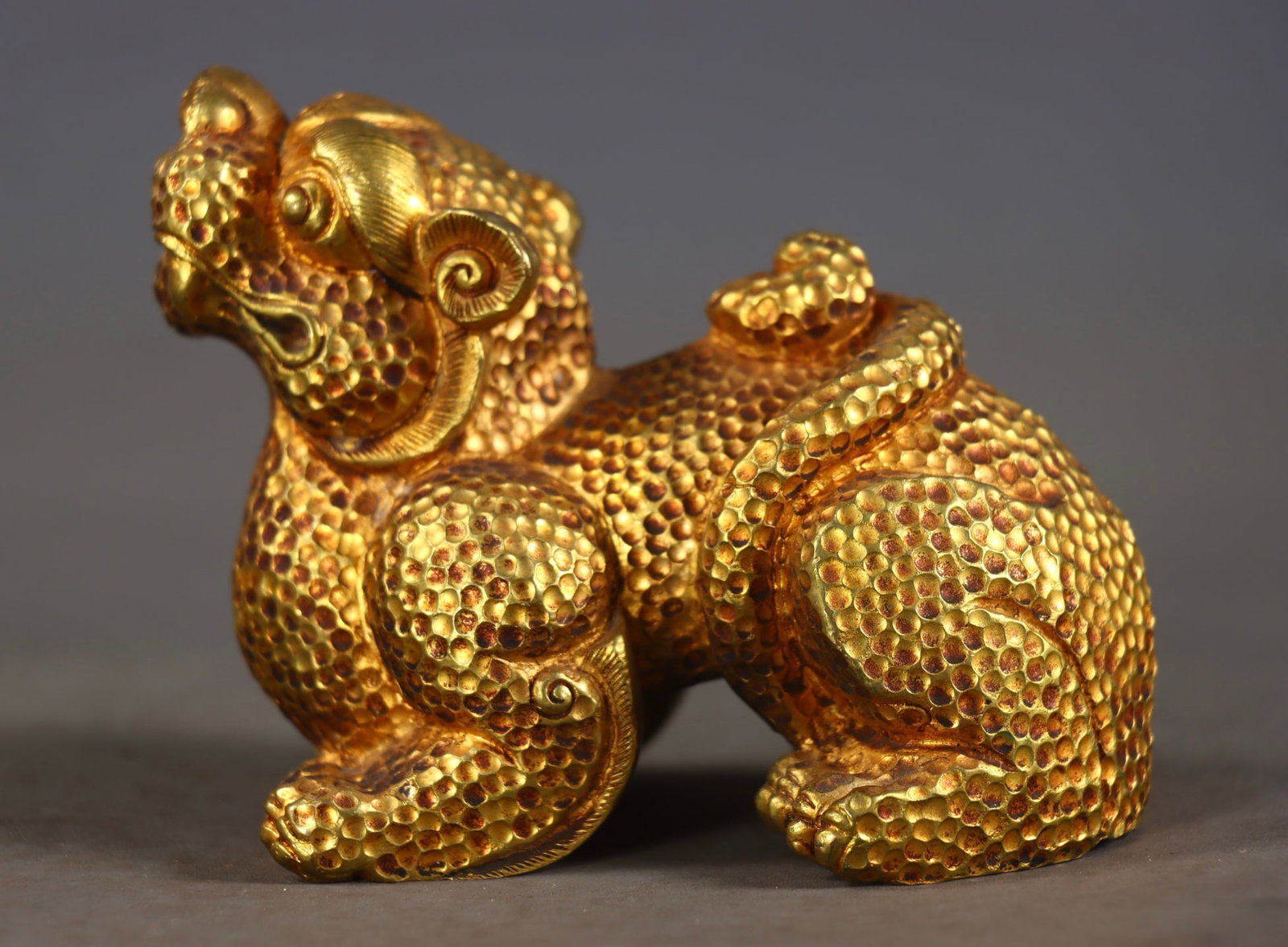 A fine copper gilt beast (1 of 8)