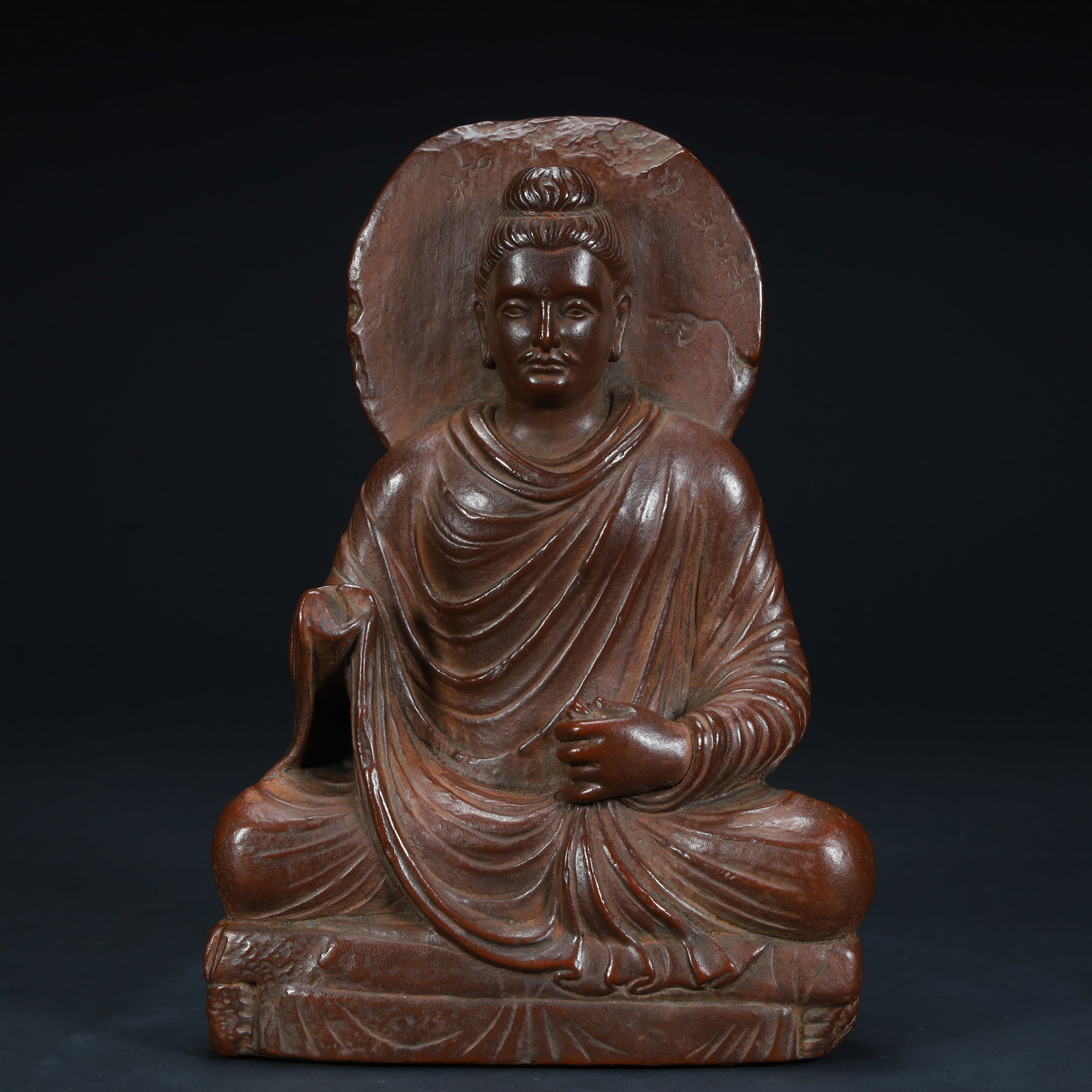 A seated Buddha statue of Gandhara-style red clay Buddha from the Qing Dynasty (1 of 12)