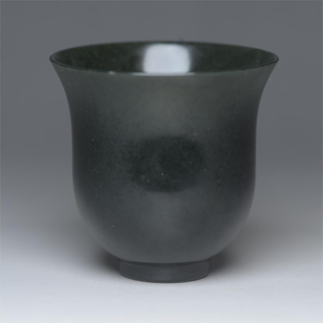 A beautiful Hetian jade cup: Exquisite Hetian jade cup Size:6.2x6.2x6.1cm W:0.066kg (The Dimensions Of All Batches Are Manually Measured.If You Need More Detailed Information, Please Contact Our Customer Service Before Bidding.)