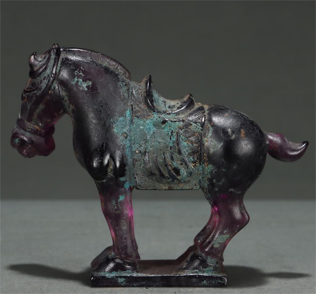 A glazed horse ornament from the Warring Han Dynasty (1 of 9)