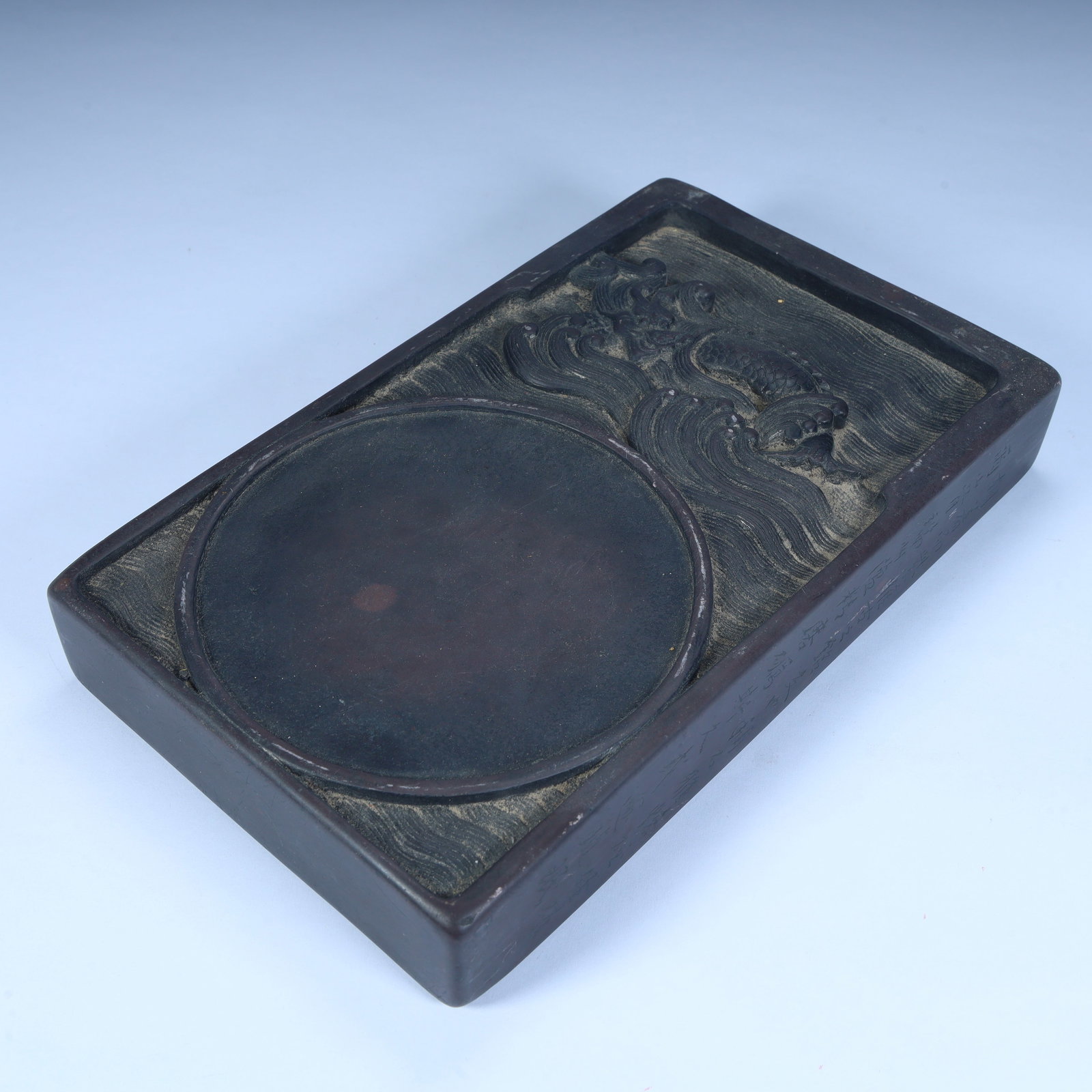 A Qing Dynasty Duanshi Haiyanhe Qing-patterned rectangular inkstone: Qing Dynasty's Duanshi Haiyanhe Qing-patterned rectangular inkstone Size:H:3.8cmxL:22.5cmxW:13.5cm W: 2.8kg (The Dimensions Of All Batches Are Manually Measured.If You Need More Detailed Information, 