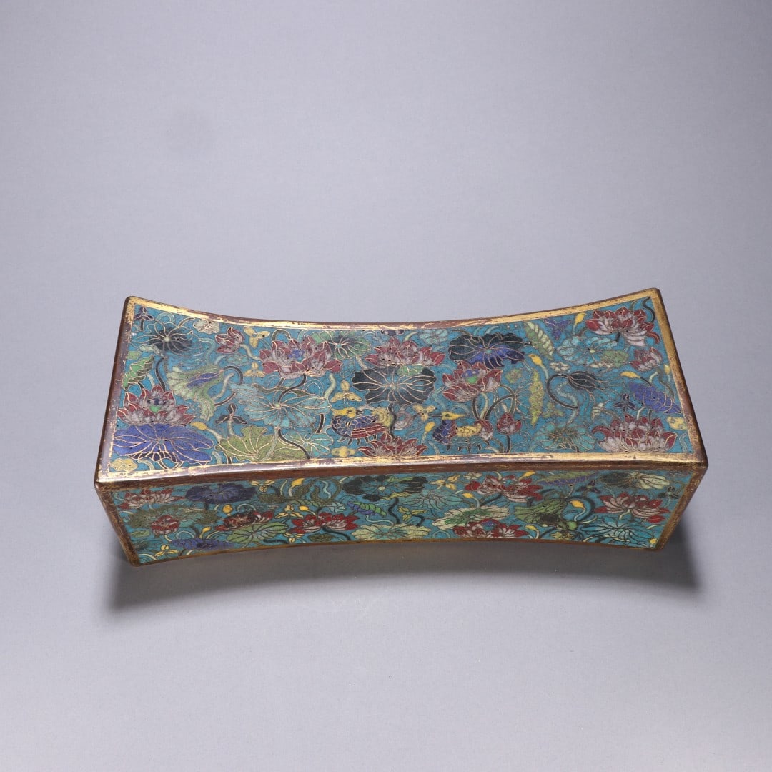 A copper-gilt cloisonné of the Qing Dynasty: Qing Dynasty copper gilt cloisonné pillow Size:H:9.1cm W:29.3cm W:1.8128kg (The Dimensions Of All Batches Are Manually Measured.If You Need More Detailed Information, Please Contact Our Customer Serv