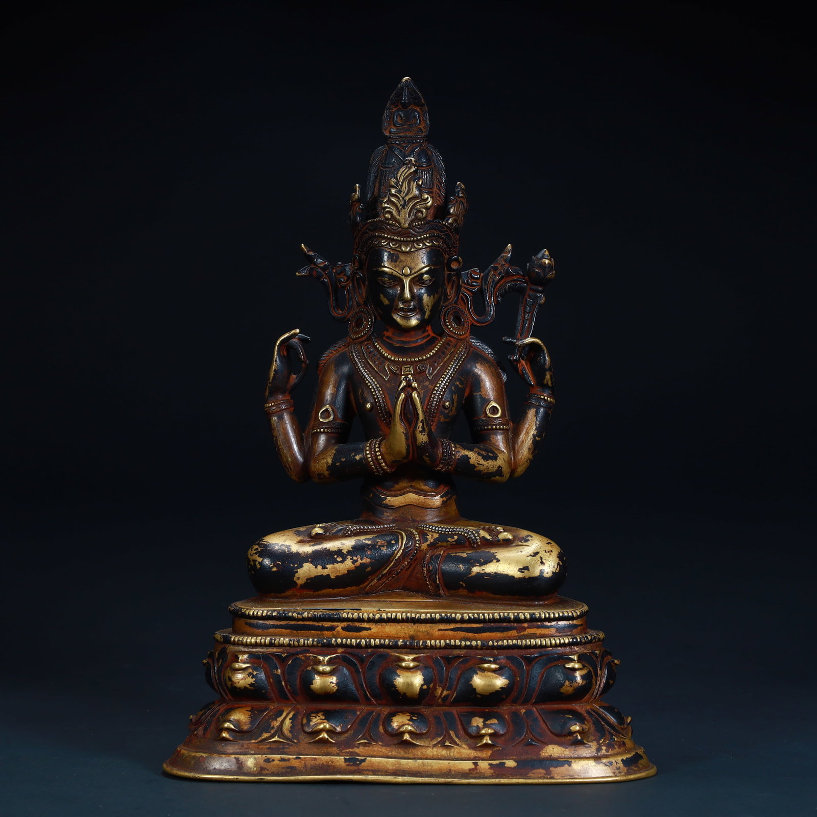 A bronze clay gold four-armed Guanyin statue from the Qing Dynasty: Qing Dynasty copper clay gold four-armed Guanyin statue Size:H:25cmxL:16cmxW:9.8cm W: 1.8kg (The Dimensions Of All Batches Are Manually Measured.If You Need More Detailed Information, Please Contact O