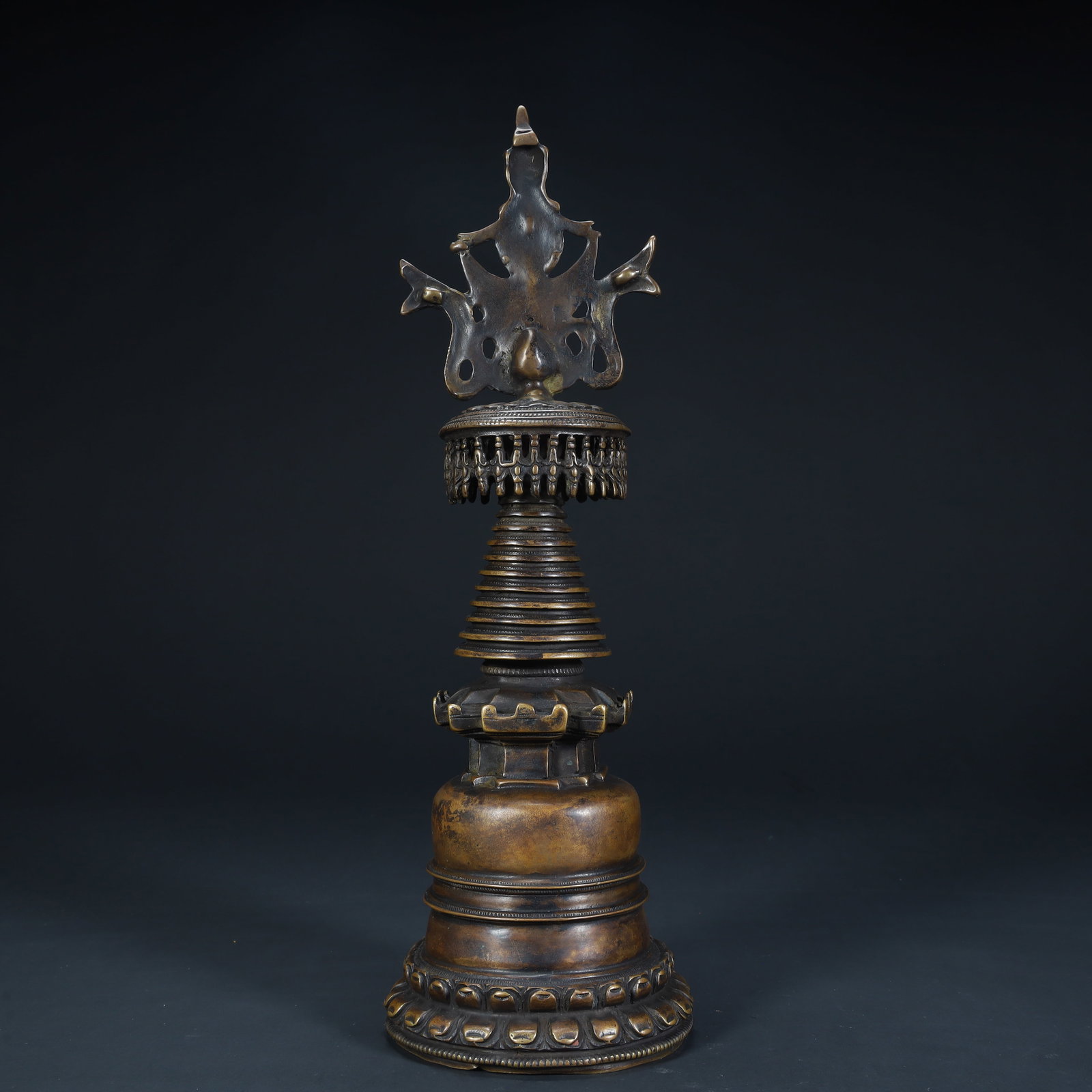 A copper Kadam pagoda from the Qing Dynasty: The copper Kadam Pagoda of the Qing Dynasty Size:H:29cmxL:9.5cmxW:9.5cm W: 0.928kg (The Dimensions Of All Batches Are Manually Measured.If You Need More Detailed Information, Please Contact Our Custom