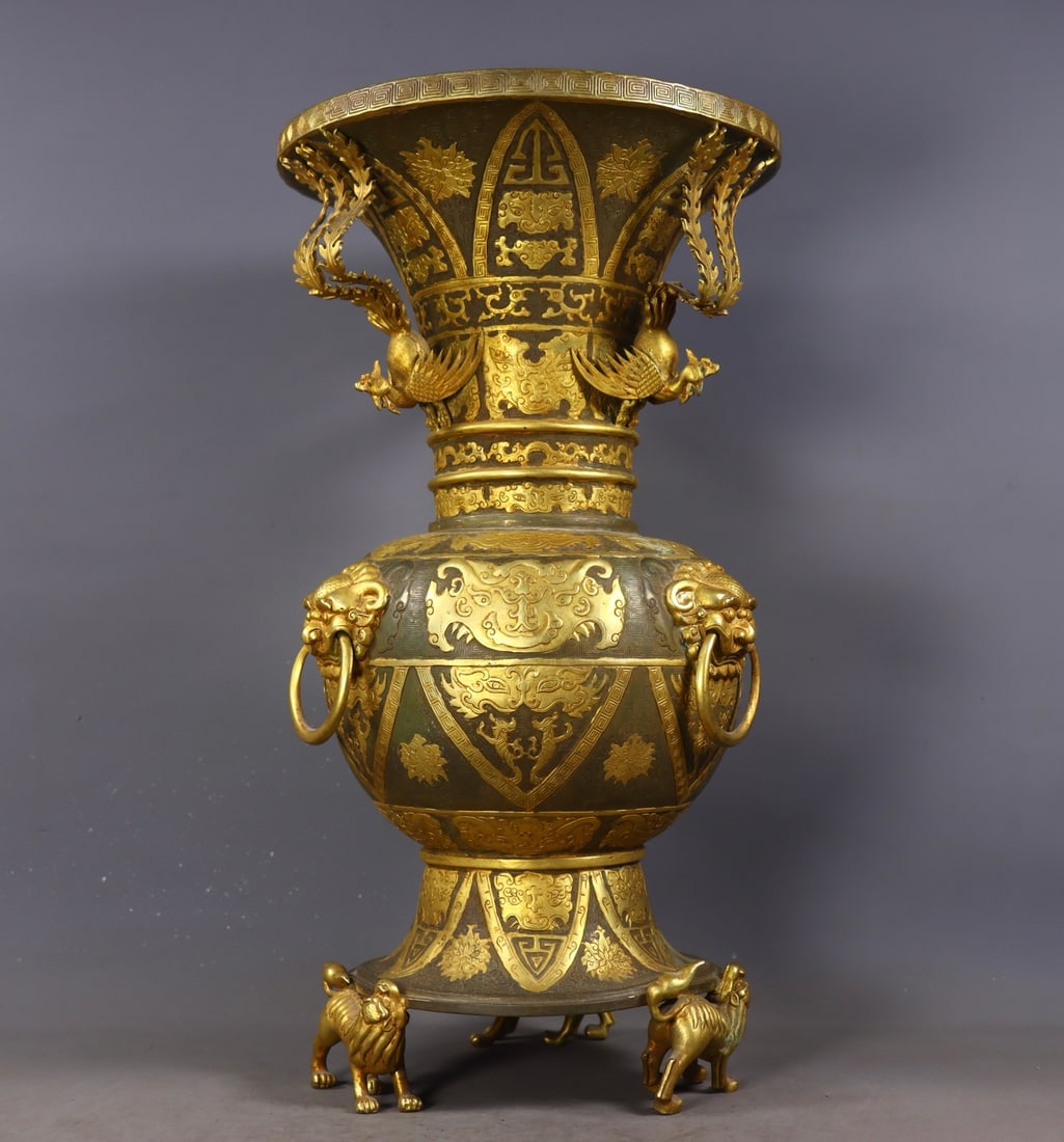 A piece of the Tang Dynasty's finest period partially gilded high-relief engraved animal face statue: In the Tang Dynasty's finest period, partial gilded high-relief carvings carved animal face statues Size: Diameter: 22 cm; H: 41.5 cm; Weight: 4.97 kg (The Dimensions Of All Batches Are Manually Measu