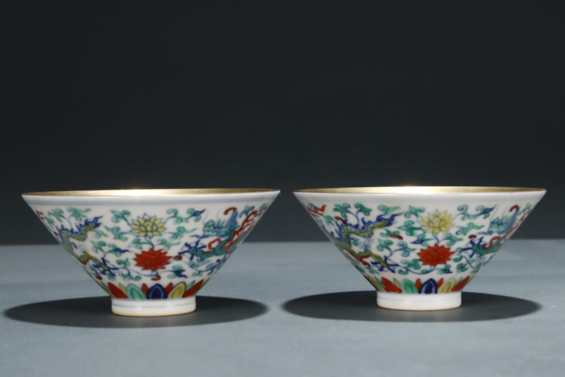 A Ming Dynasty Doucai entwined lotus dragon pattern hat cup: Ming Dynasty's Doucai entwined lotus dragon pattern bucket hat cup Size:H:4.5cm Belly diameter:9.7cm (The Dimensions Of All Batches Are Manually Measured.If You Need More Detailed Information, Please
