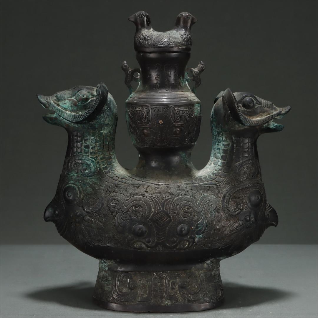 A bronze double sheep statue of the Han Dynasty: The bronze double sheep of the Han Dynasty Size:H:32cm Belly diameter:26cm (The Dimensions Of All Batches Are Manually Measured.If You Need More Detailed Information, Please Contact Our Customer Servi