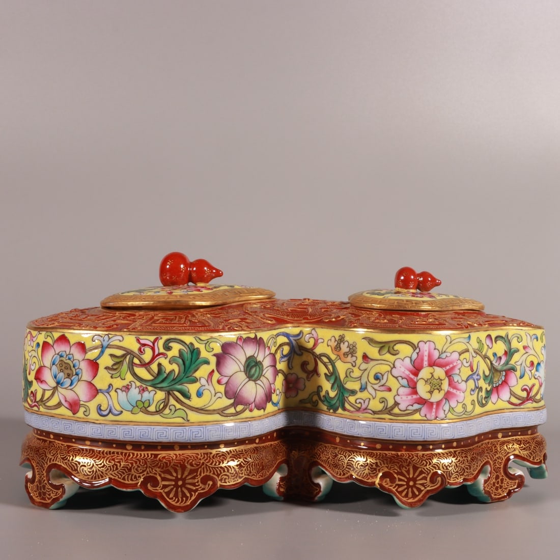 A Qing Dynasty enamel colorful yellow ground carved entwined lotus gourd washed: The enamel of the Qing Dynasty is carved on a yellow ground, and the entwined lotus gourd is washed Size:H:9.5cm L:19.6cm Belly diameter:13cm (The Dimensions Of All Batches Are Manually Measured.If Yo
