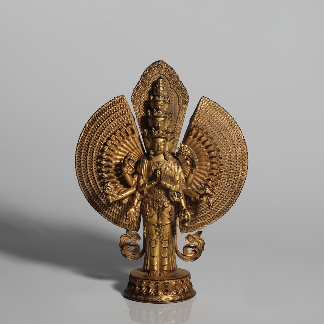 A Ming Dynasty finely cast bronze tire gilt thousand-handed Guanyin statue (1 of 9)