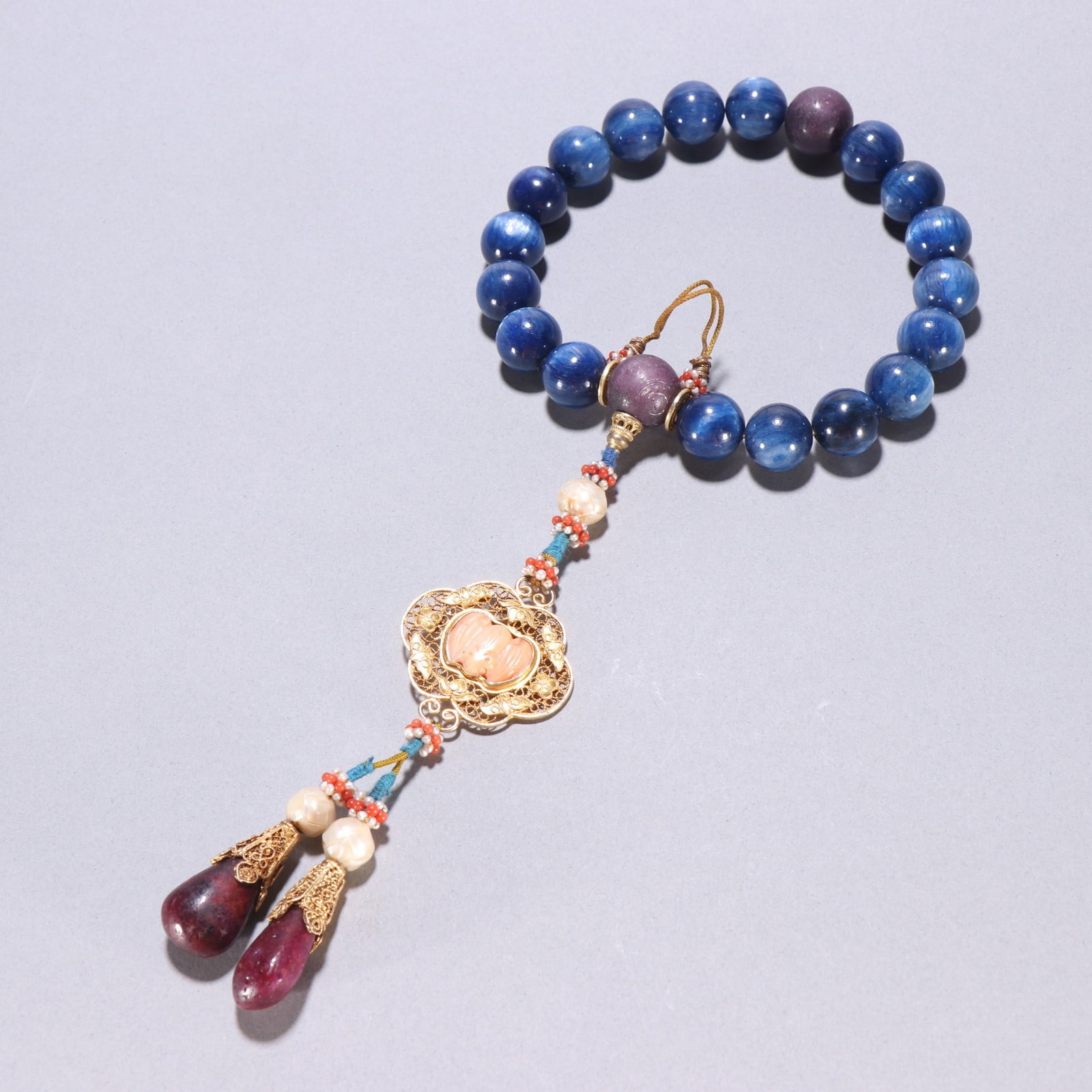A piece of kyanite from the Qing Dynasty held by eighteen sons (1 of 9)