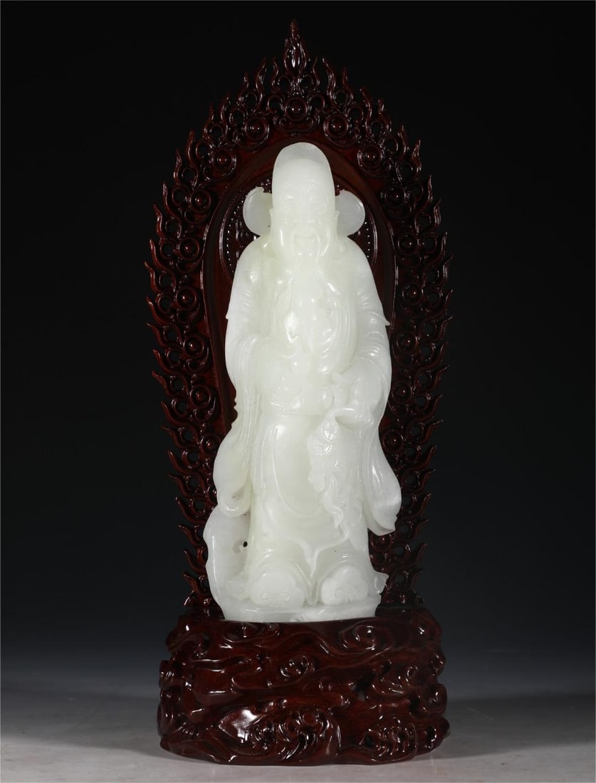 A Hetian white jade civil official of the Qing Dynasty: The Hetian white jade civil servant of the Qing Dynasty Size:H:23cm W:9cm W:1.15kg (The Dimensions Of All Batches Are Manually Measured.If You Need More Detailed Information, Please Contact Our