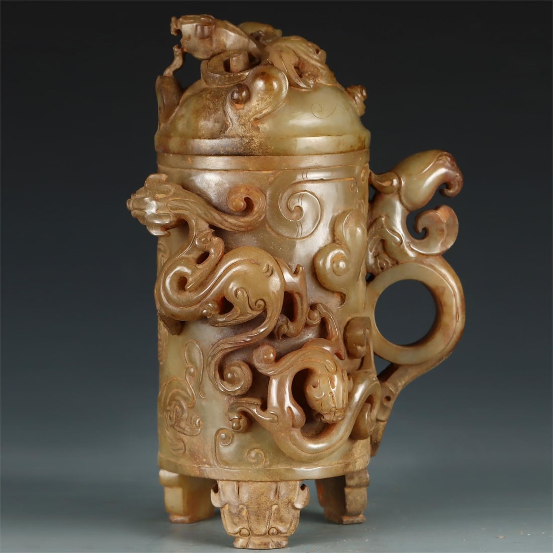 A piece of Hetian jade beast guarding the cup of the Qing Dynasty (1 of 9)