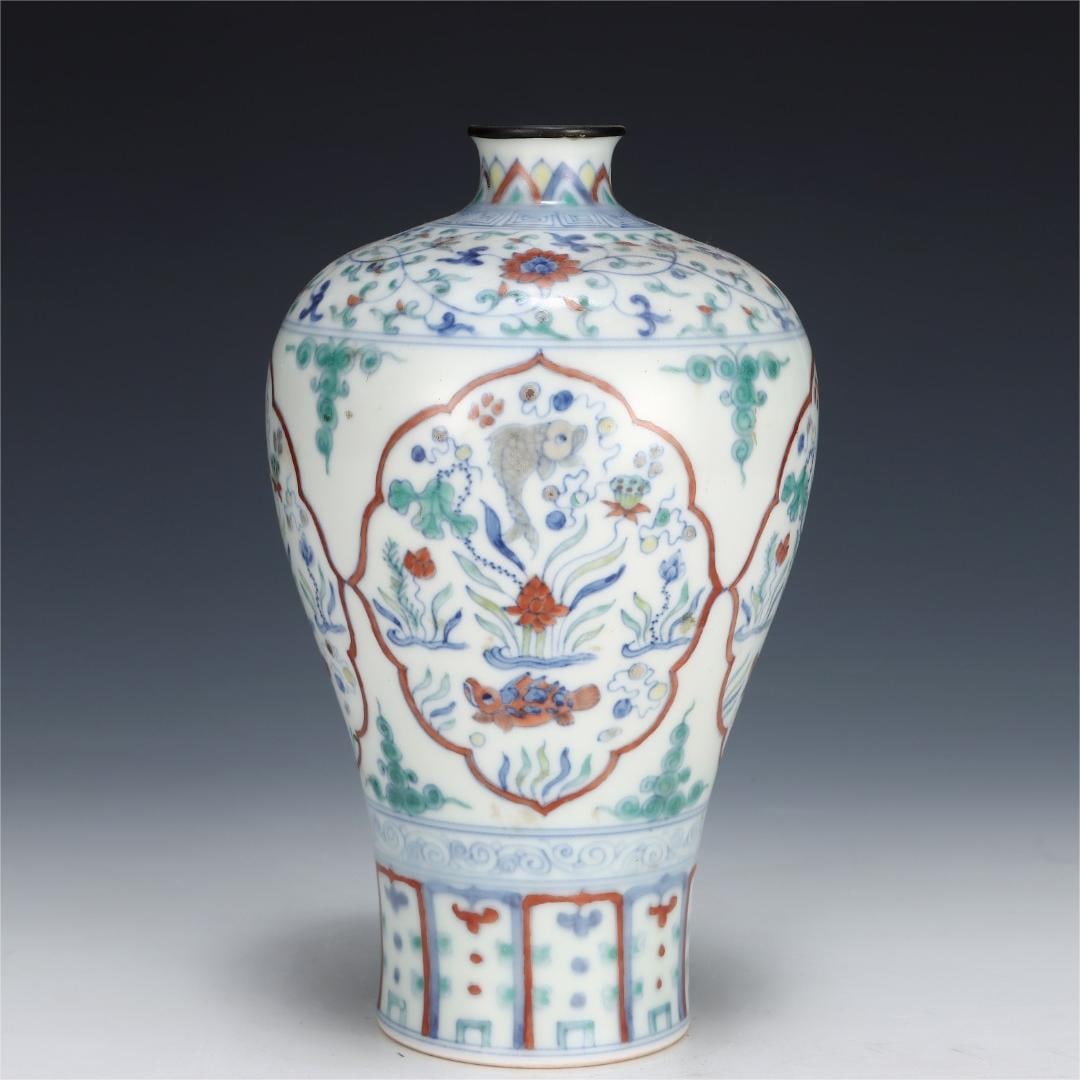 A Doucai open-window fish algae pattern plum bottle made in the Ming Dynasty Chenghua year: Ming Dynasty Chenghua year Doucai window fish algae pattern plum bottle Size:H:20.5cm Belly diameter:12.5cm (The Dimensions Of All Batches Are Manually Measured.If You Need More Detailed Information, 
