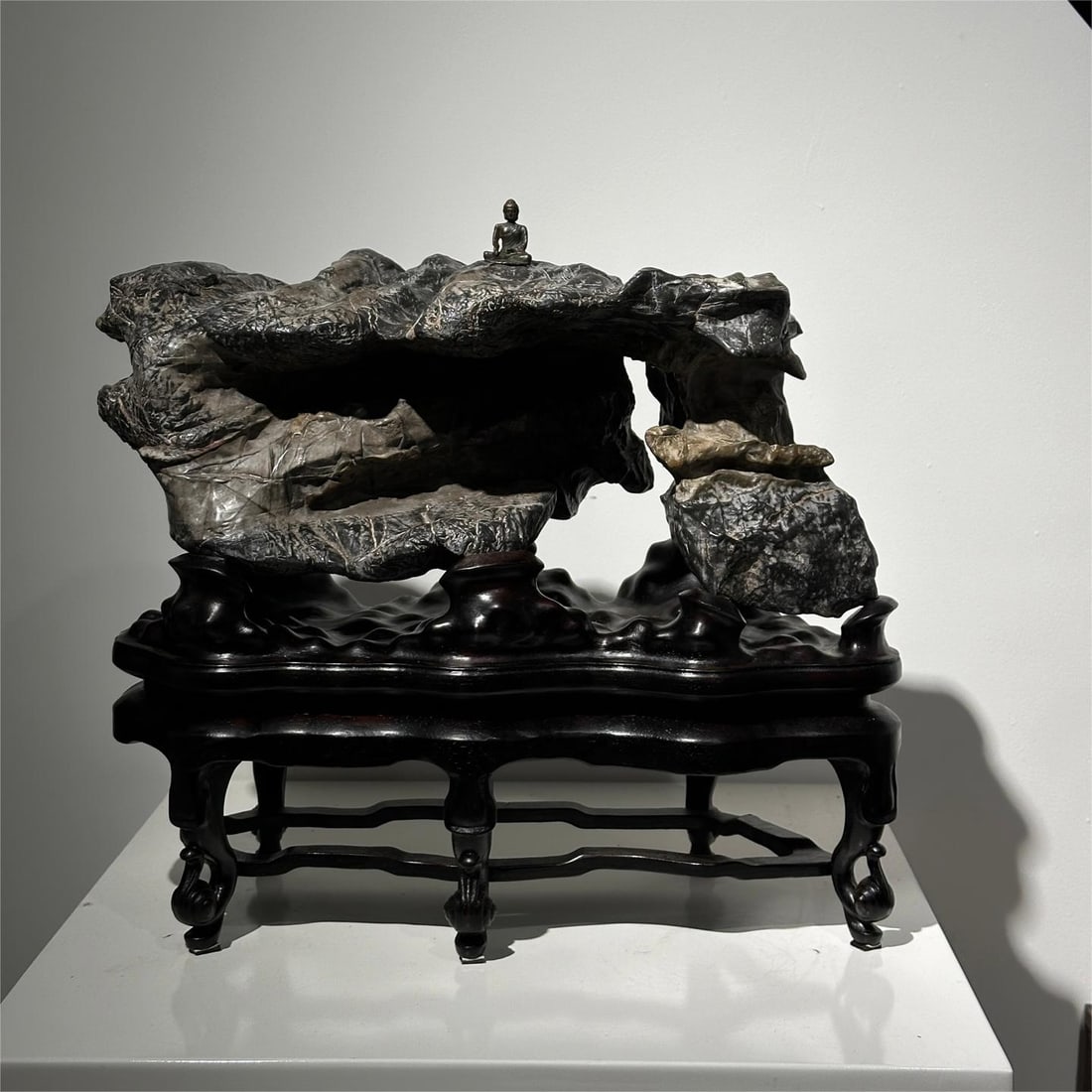 A fine Lingbi stone: Exquisite Lingbi stone Size:L:52cm H:44cm T:22cm (The Dimensions Of All Batches Are Manually Measured.If You Need More Detailed Information, Please Contact Our Customer Service Before Bidding.)