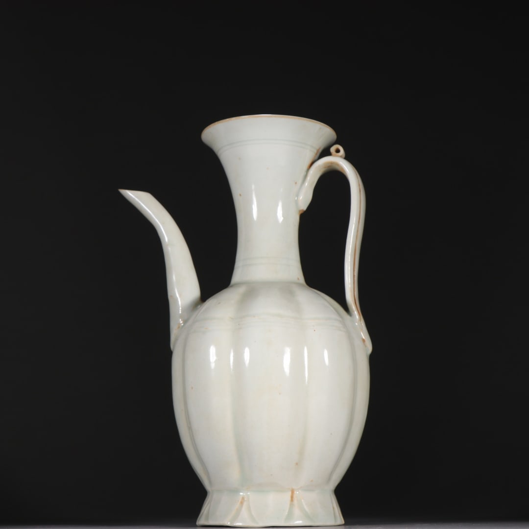 A shadow celadon glazed melon edge pot of the Song Dynasty: Song Dynasty shadow celadon glazed melon edge pot Size:H:21cm W:13.5cm (The Dimensions Of All Batches Are Manually Measured.If You Need More Detailed Information, Please Contact Our Customer Service