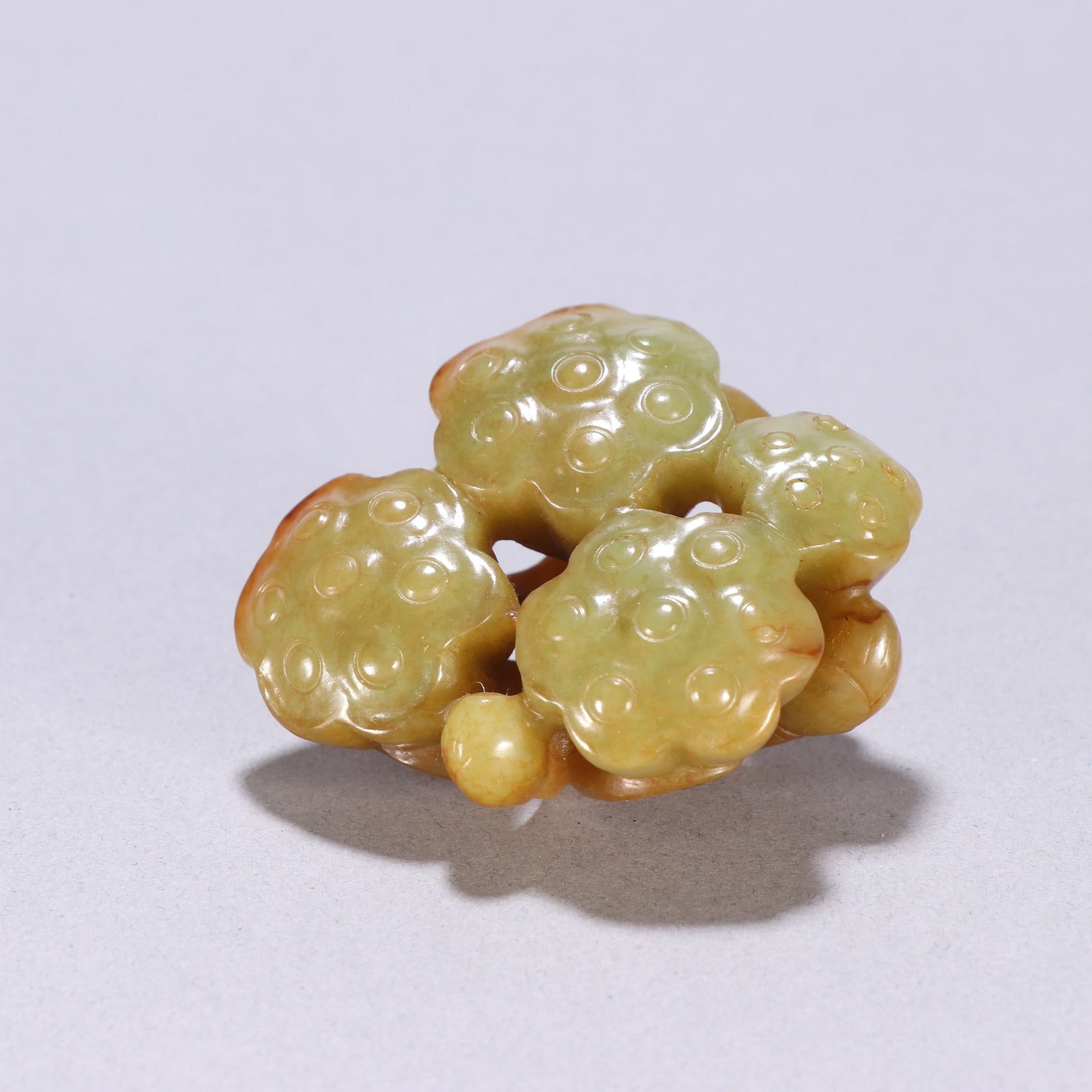 A carving of Hetian topaz lotus pod from the Qing Dynasty: Qing Dynasty Hetian topaz lotus pod carving Size:H:2.9cm W:4.8cm W:0.0715kg (The Dimensions Of All Batches Are Manually Measured.If You Need More Detailed Information, Please Contact Our Customer Serv