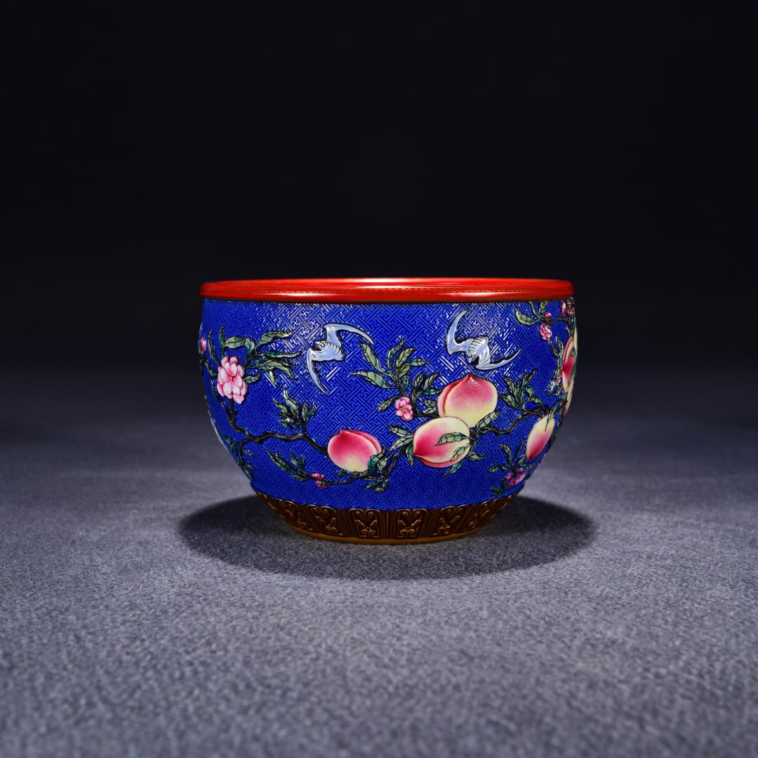 A blue ground carved pastel Fushou double picture jar made in the Qianlong era of the Qing Dynasty: The blue ground carving pastel Fushou double picture cylinder made in the Qianlong period of the Qing Dynasty Size:H:10x15cm (The Dimensions Of All Batches Are Manually Measured.If You Need More Detai