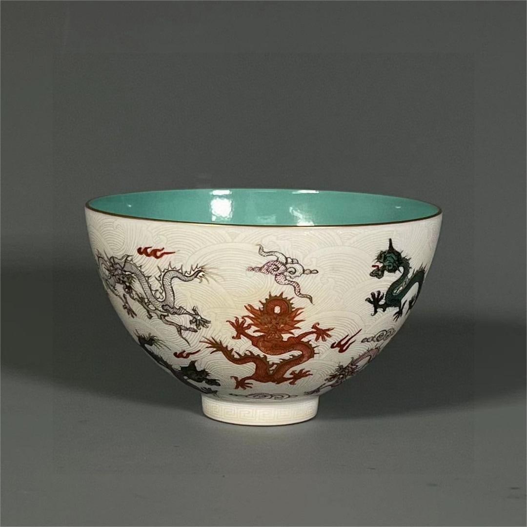A double dragon bead tea cup of the official kiln of the Qing Dynasty: The double dragon pearl tea cup of the official kiln of the Qing Dynasty Size:H:6cm Calibre:9.7cm Bottom:3.2cm (The Dimensions Of All Batches Are Manually Measured.If You Need More Detailed Informatio