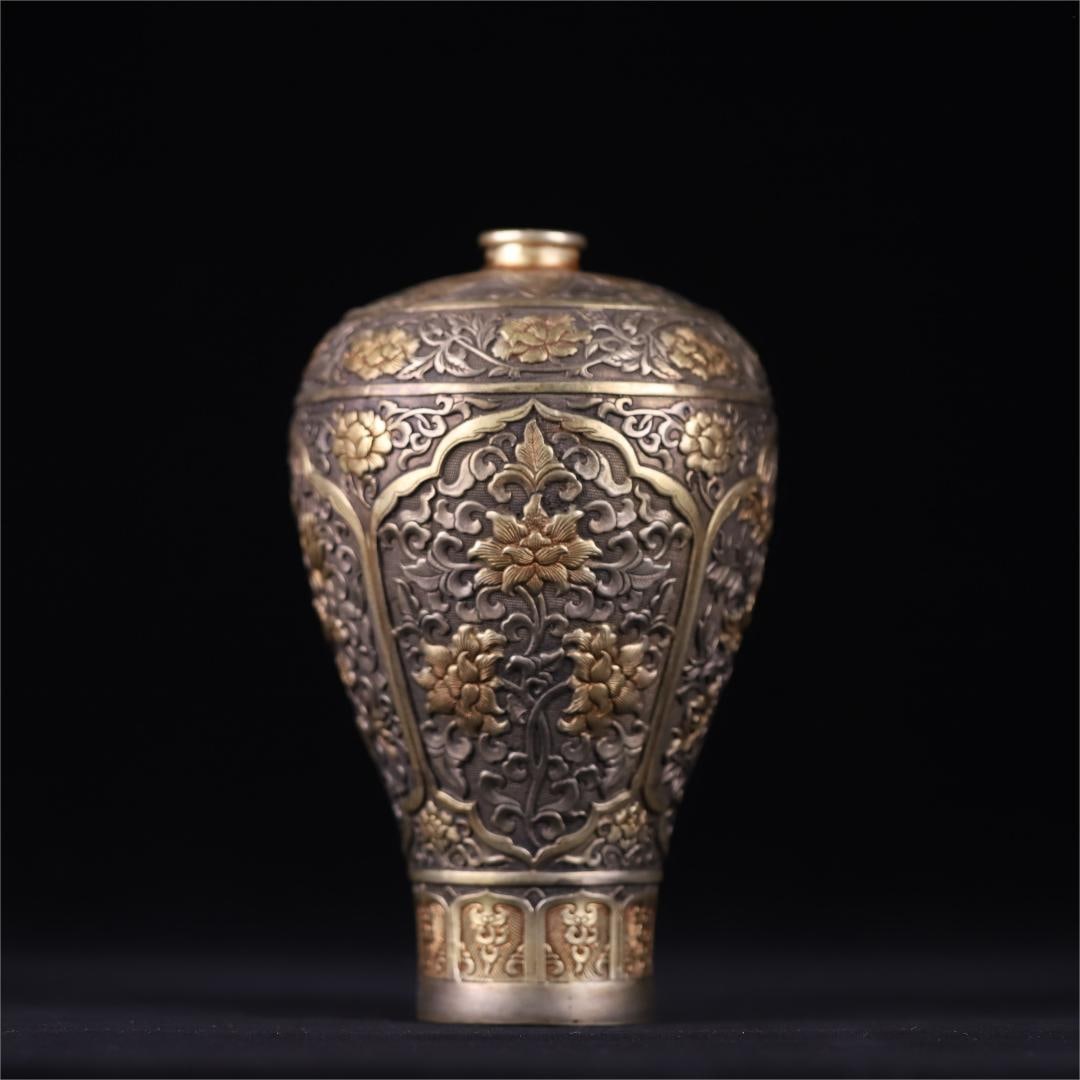 A Tang Dynasty Tang Dynasty Zhenguan silver-gilt gold plum bottle (1 of 9)