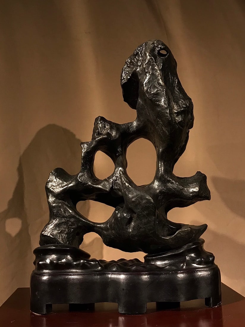 A piece of exquisite Taihu Lake Liuyun: Exquisite Taihu Lake Liuyun Size:H:63cm W:44cm T:19cm (The Dimensions Of All Batches Are Manually Measured.If You Need More Detailed Information, Please Contact Our Customer Service Before Bidding.)