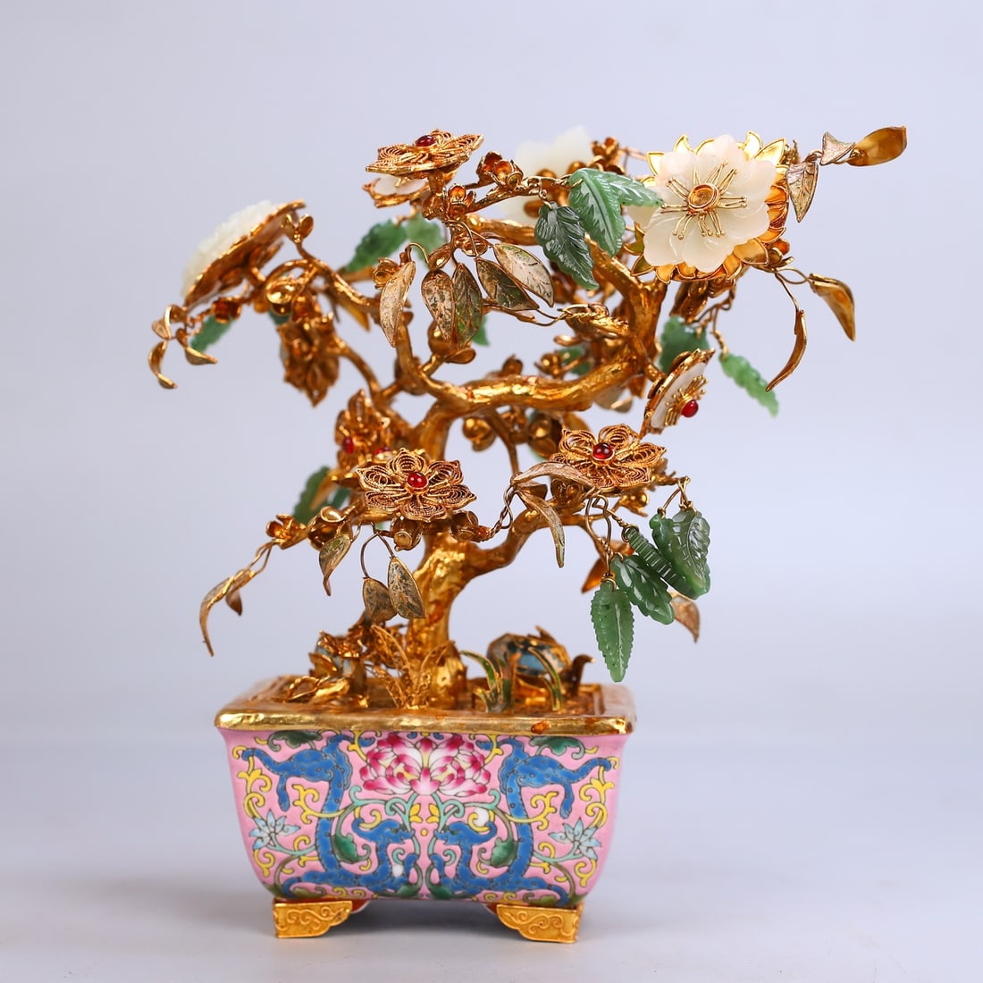 A fine copper-gilt inlaid Hetian jade jasper flower pastel enamel bonsai: Exquisite copper gilt inlaid Hetian jade jasper flower pastel enamel bonsai Size:H:26cm W:20cm W:0.955kg (The Dimensions Of All Batches Are Manually Measured.If You Need More Detailed Information, Ple
