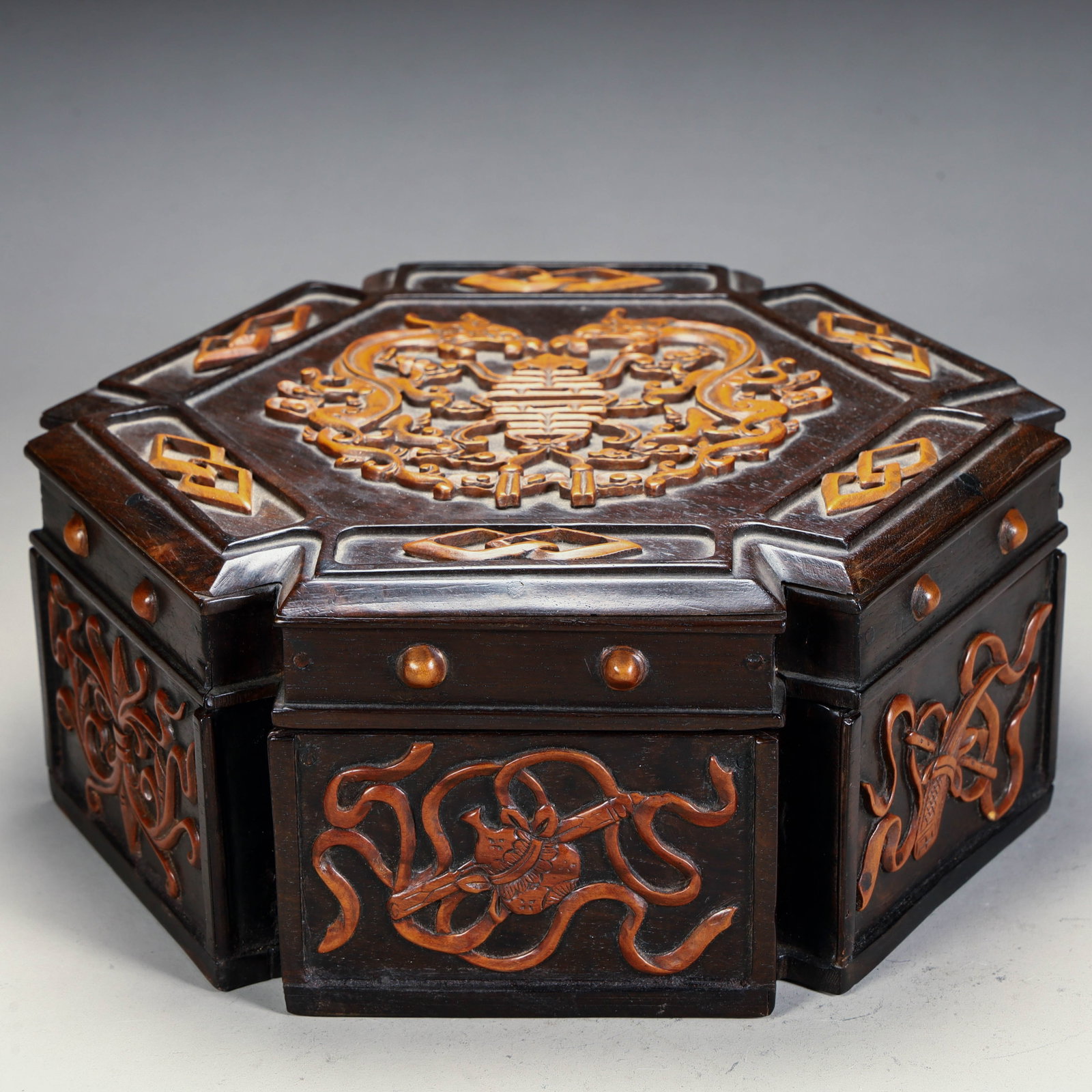A Qing Dynasty rosewood inlaid boxwood Fushou Eight Treasure Pattern Collection: Qing Dynasty rosewood inlaid boxwood Fushou Eight Treasure Pattern Collection Size: L: 9cm W:22cm H:20cm W:1038g (The Dimensions Of All Batches Are Manually Measured.If You Need More Detailed