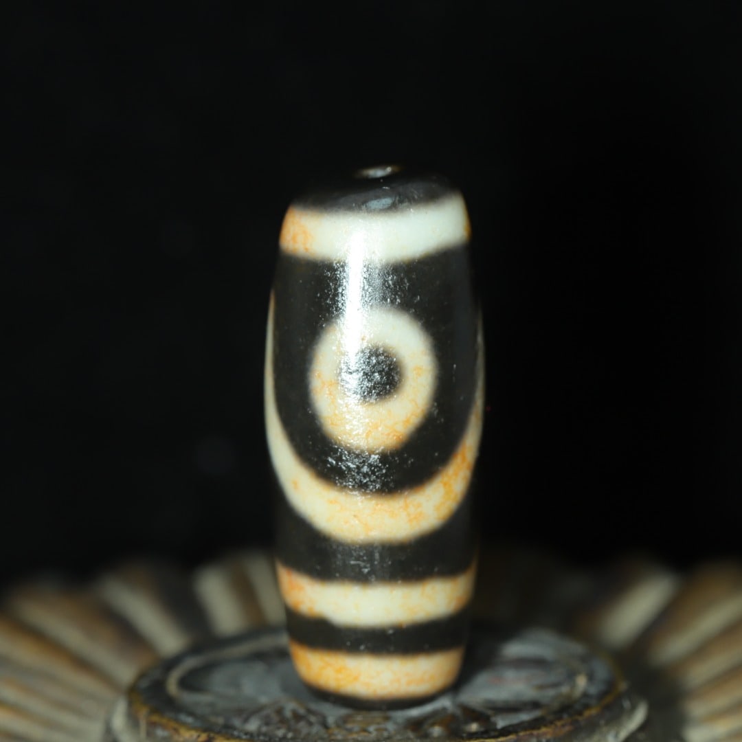 A piece of exquisite two-eyed Dzi (1 of 9)