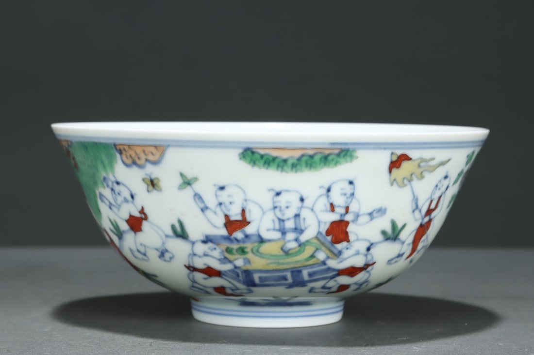 A Doucai baby play picture bowl made in the Chenghua year of the Ming Dynasty: Ming Dynasty Chenghua year system Doucai baby play picture bowl Size:H:7cm Belly diameter:15.8cm (The Dimensions Of All Batches Are Manually Measured.If You Need More Detailed Information, Please Cont
