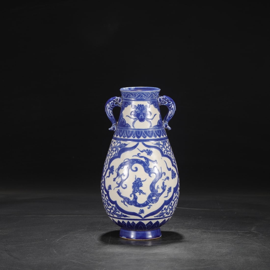 A blue-glazed carved cloud dragon pattern large ear vase from the Song Dynasty Ding kiln (1 of 9)