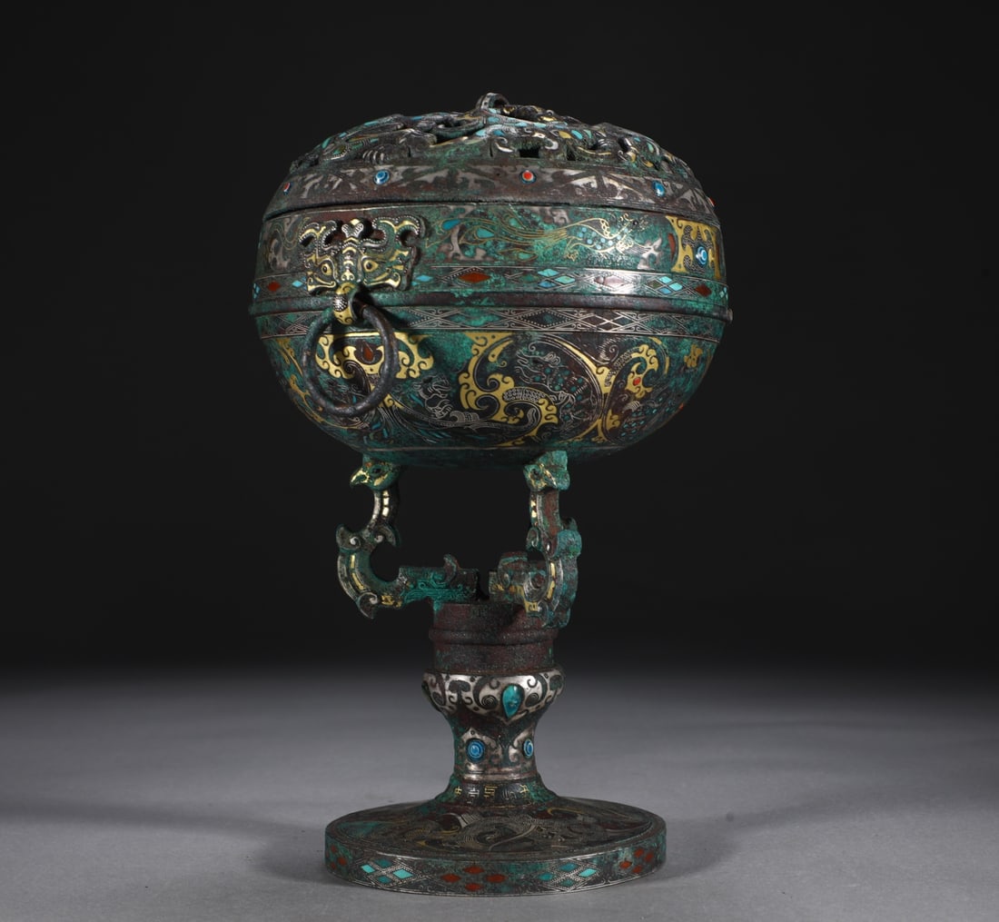 A bronze staggered gold and silver turquoise high-footed bean smoker from the Warring Han Dynasty: Bronze gold and silver inlaid turquoise high-footed bean smoker during the Warring Han Dynasty Size:H:28cm W:19.6cm W:2.75kg (The Dimensions Of All Batches Are Manually Measured.If You Need More Detai