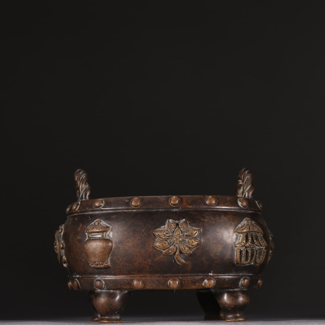 A finely crafted bronze drum-shaped incense burner with eight treasures patterns (1 of 9)