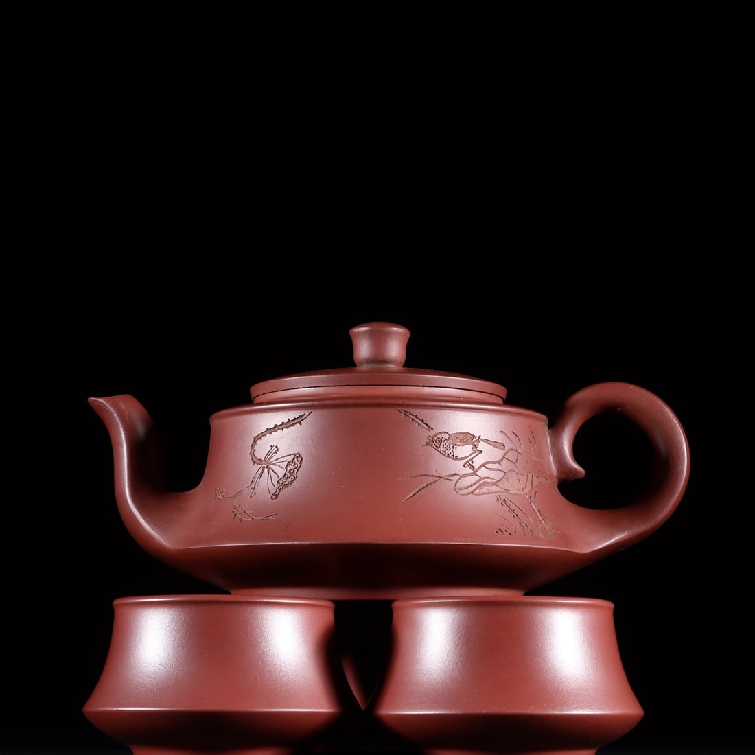A beautifully engraved set of Yixing teapots with poetry and prose (1 of 9)